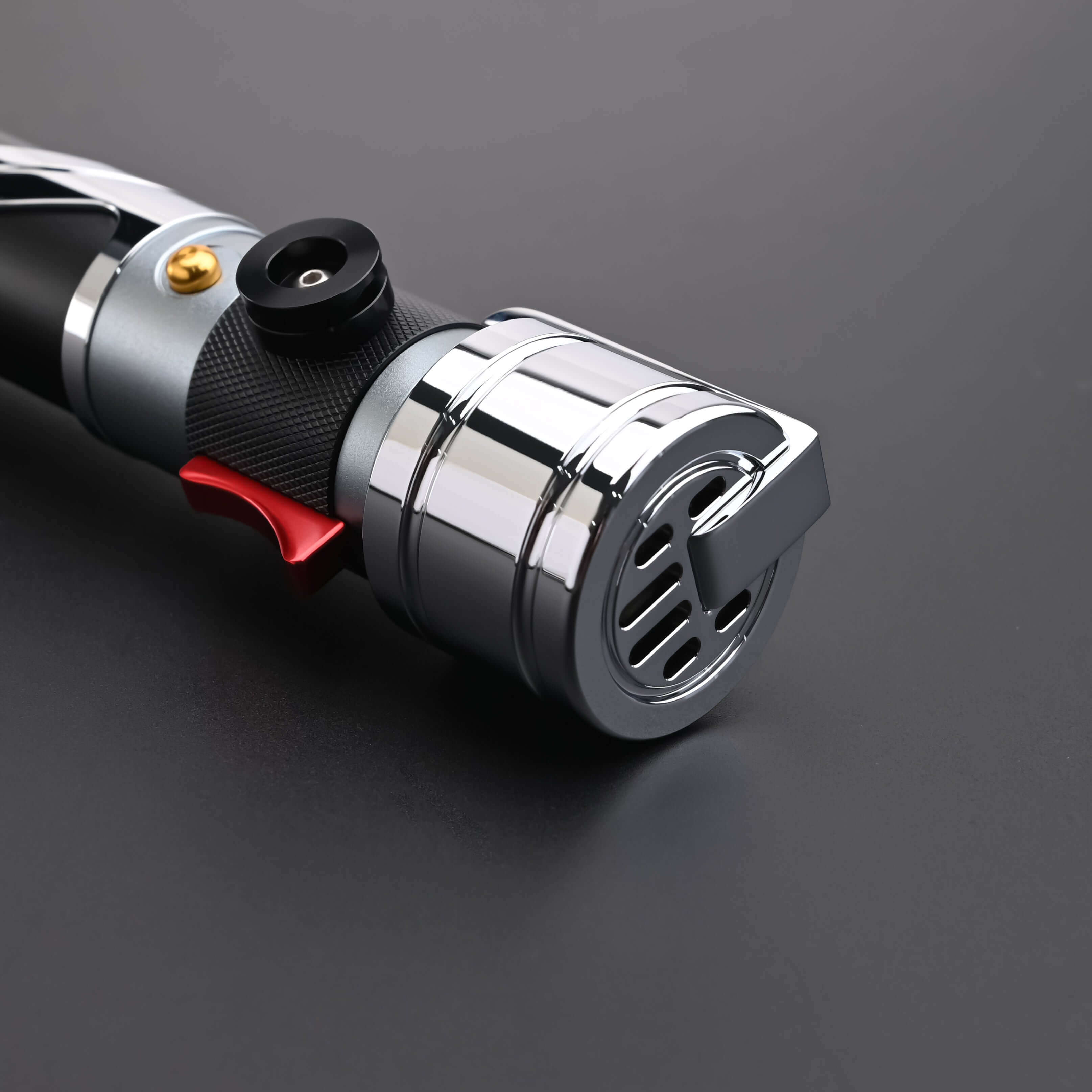 Count SE Lightsaber with black and silver hilt, spiraling silver trim, gold and red accents, and flared emitter. Crafted from aircraft-grade aluminum for balance, control, and precision.