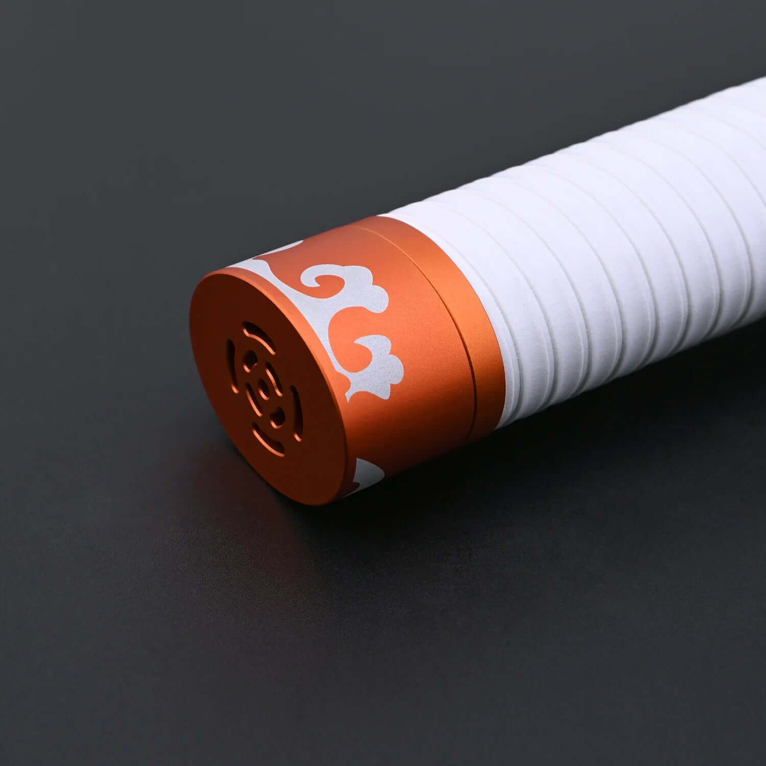 NovaSaber Demon Slayer Saber inspired by Kyojuro Rengoku, featuring a flame gold hilt, vibrant red and gold flame-shaped guard, and dynamic lighting and sound effects for immersive dueling and cosplay