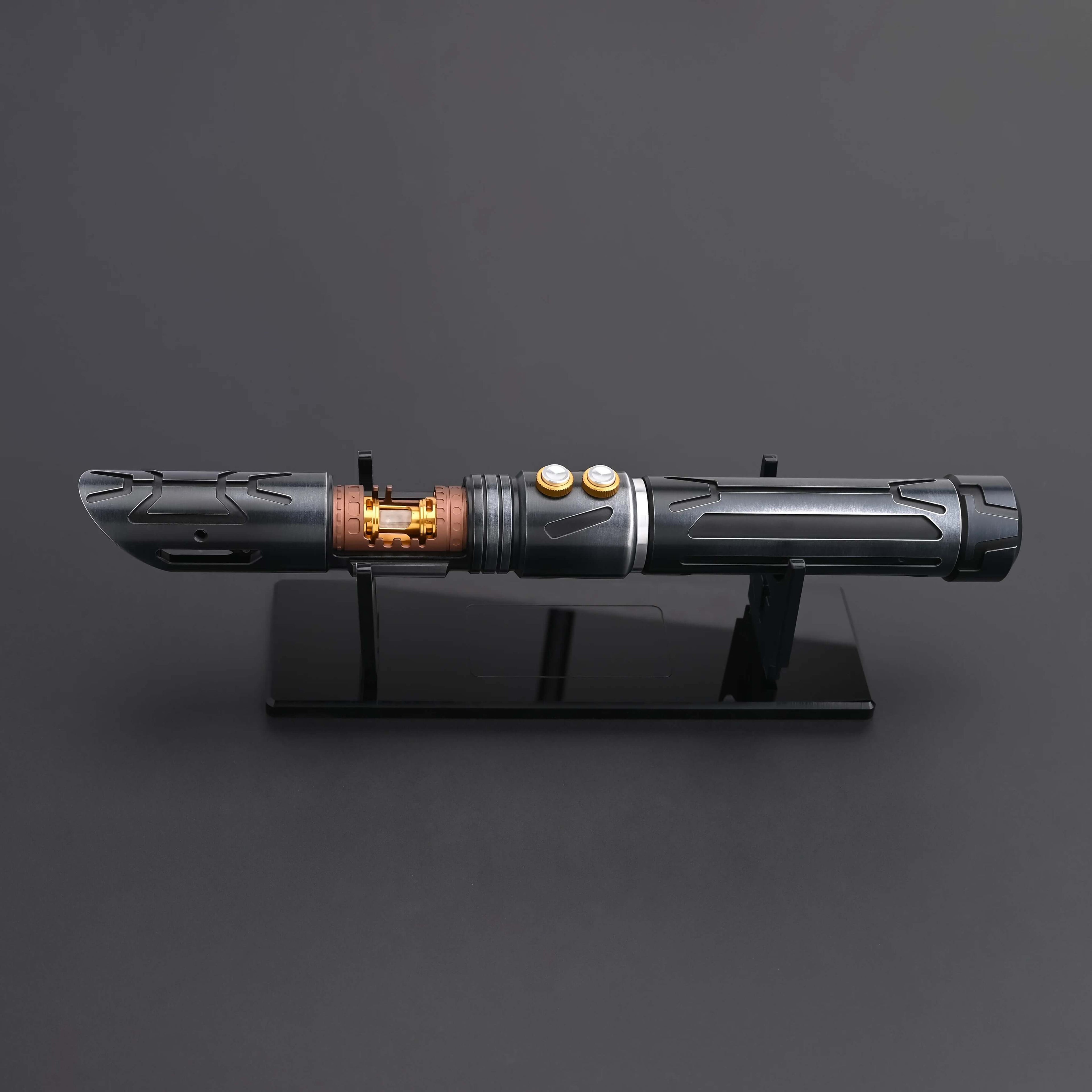 Halo crystal lightsaber displayed on a stand, showcasing its exposed crystal core and dual-button control system.