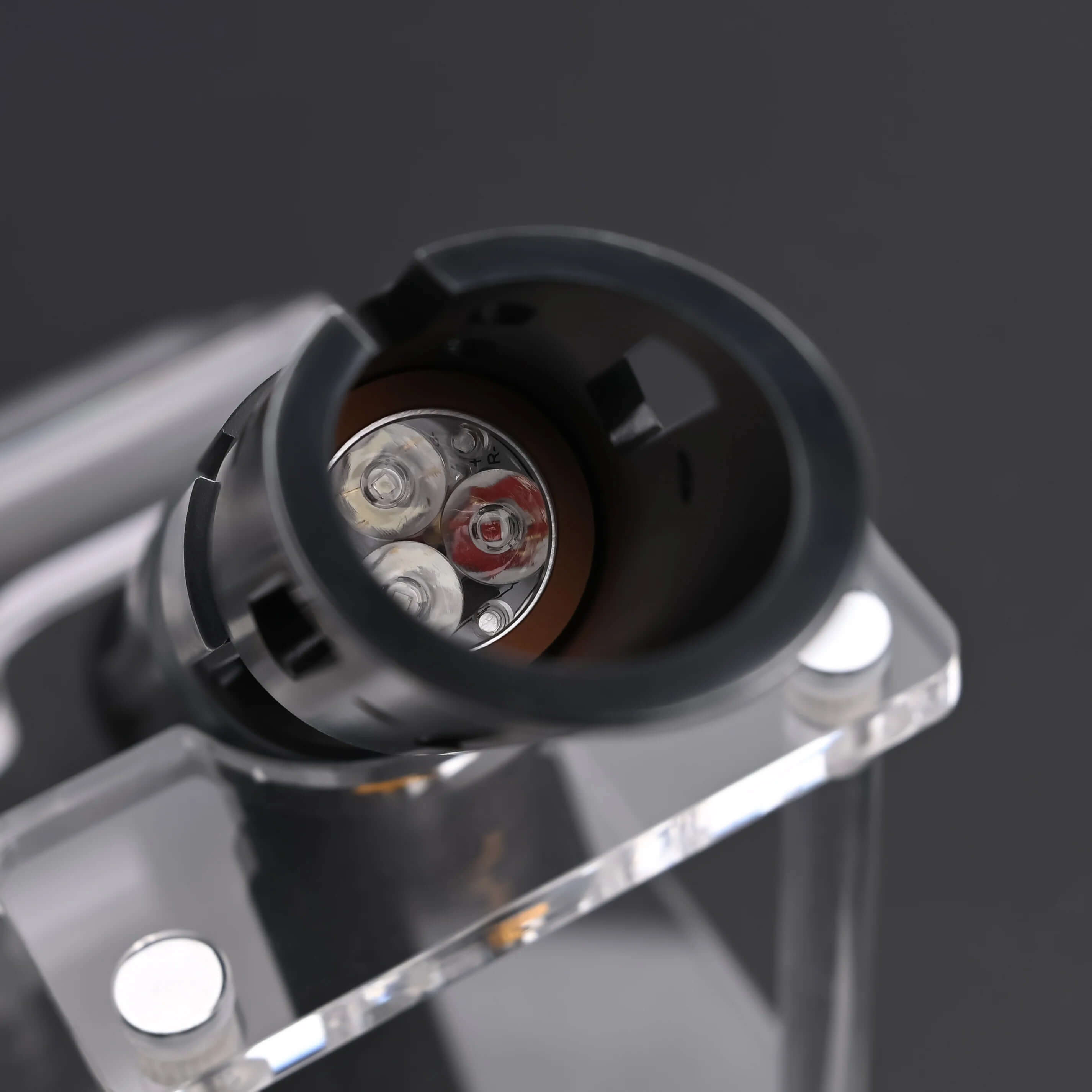 Close-up view of the Halo crystal lightsaber showing the exposed crystal core and refined control system.