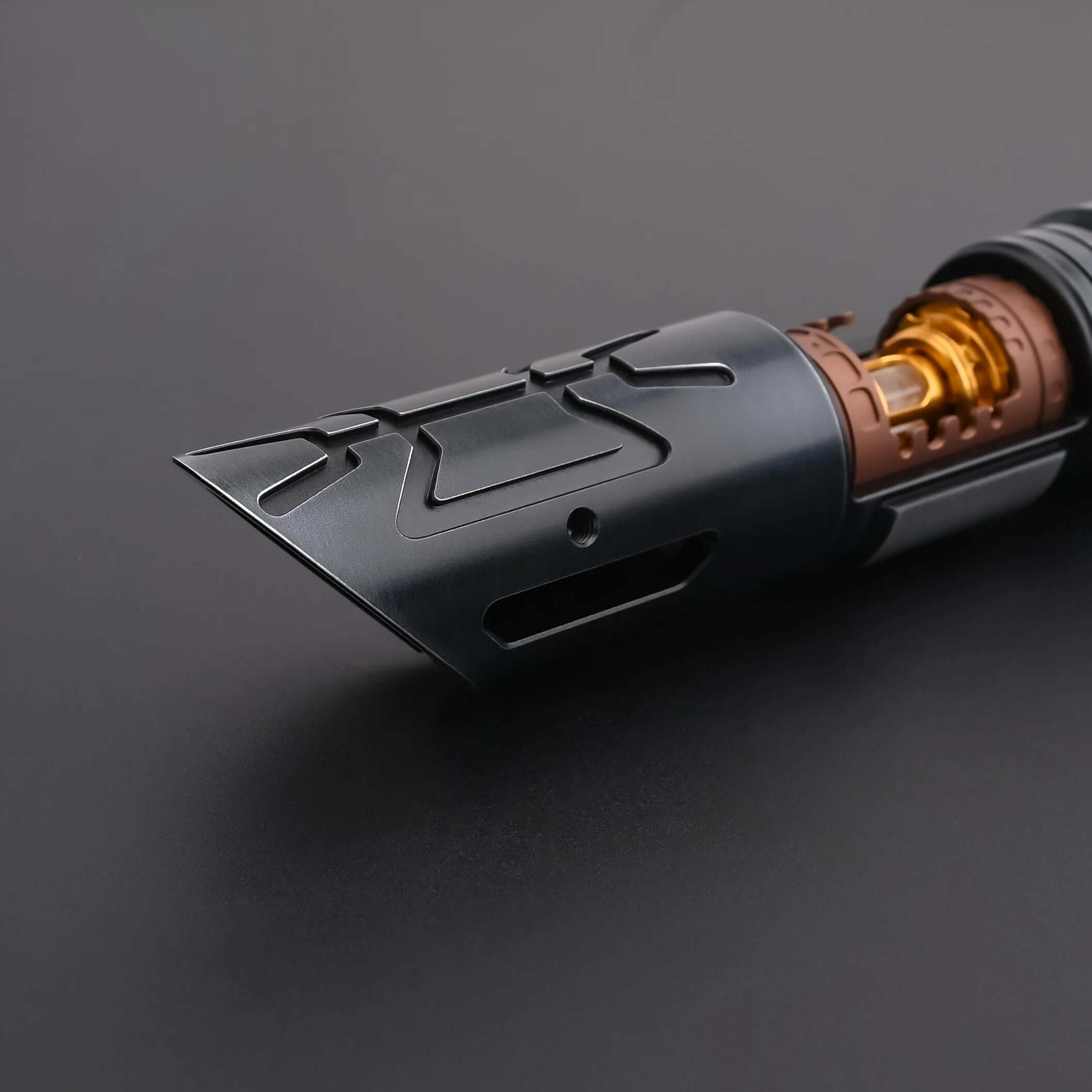 Close-up of the Halo Crystal lightsaber hilt showing detailed design and exposed crystal core.
