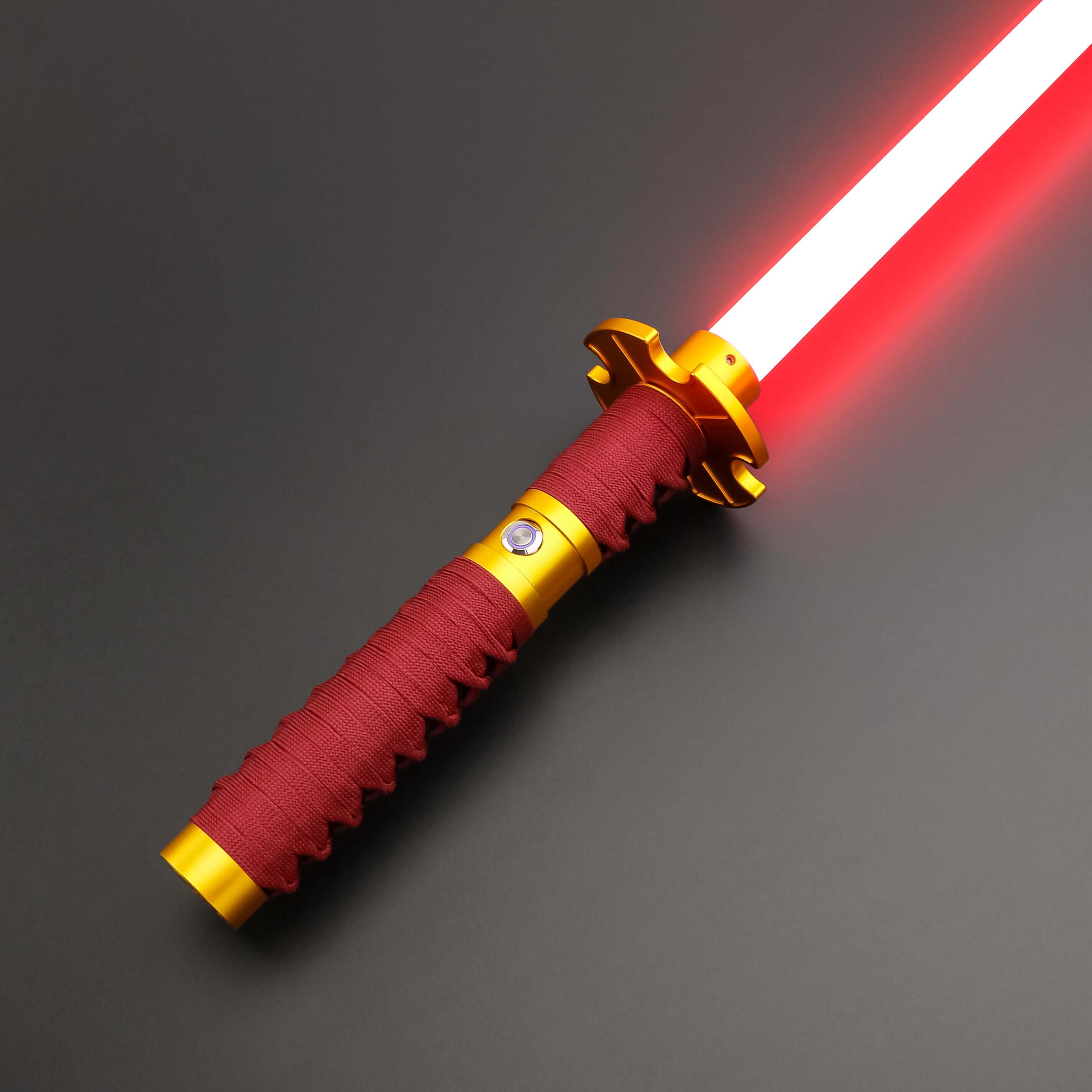 Sekiro Lightsaber: Katana-inspired design with gold hilt, red grip, and gold guard, crafted from aircraft-grade aluminum for durability and elegance.