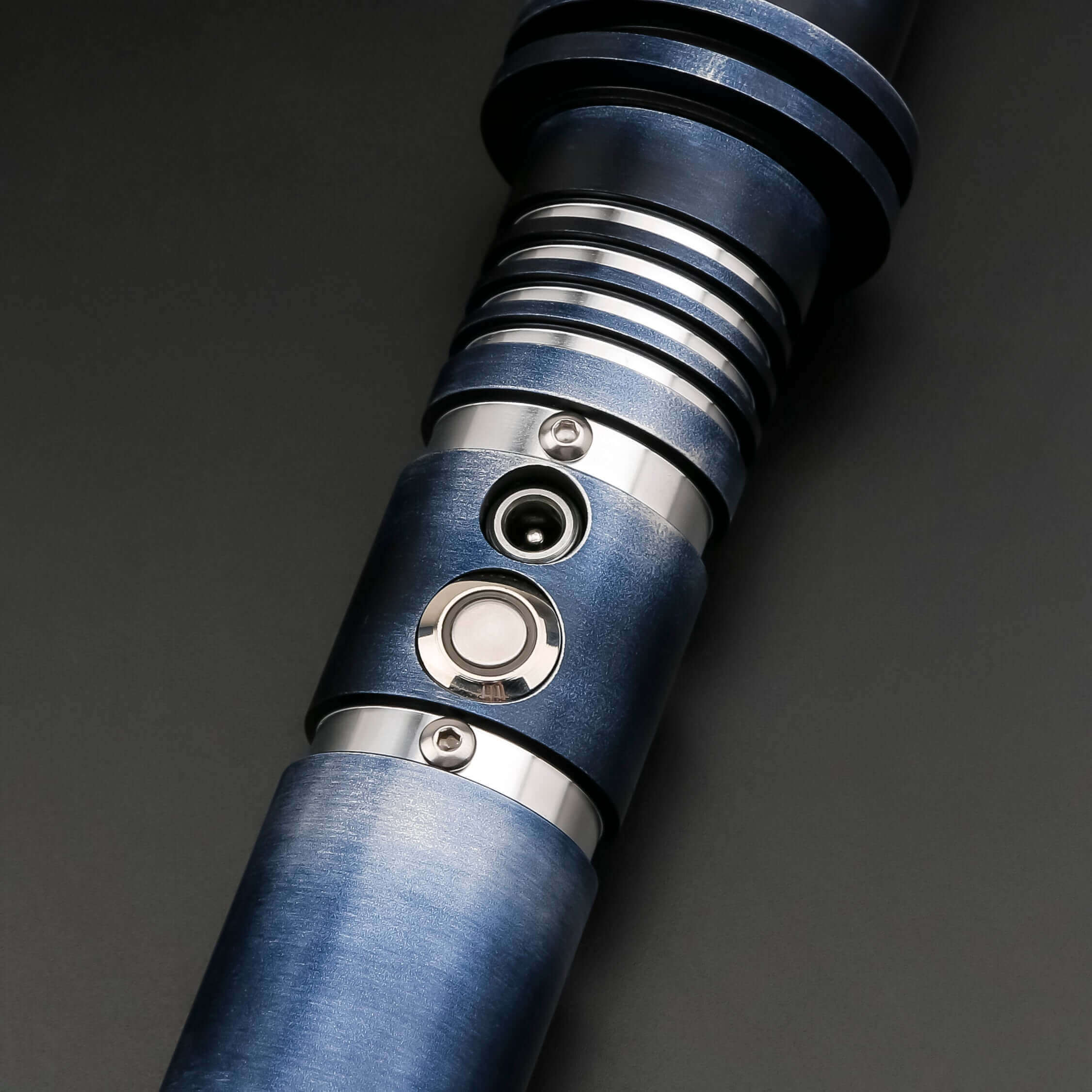Phantom Lightsaber featuring a sleek, ghostly design with a shimmering aura, crafted from aircraft-grade cast aluminum. Ideal for collectors and duelists, exuding supernatural elegance and power.