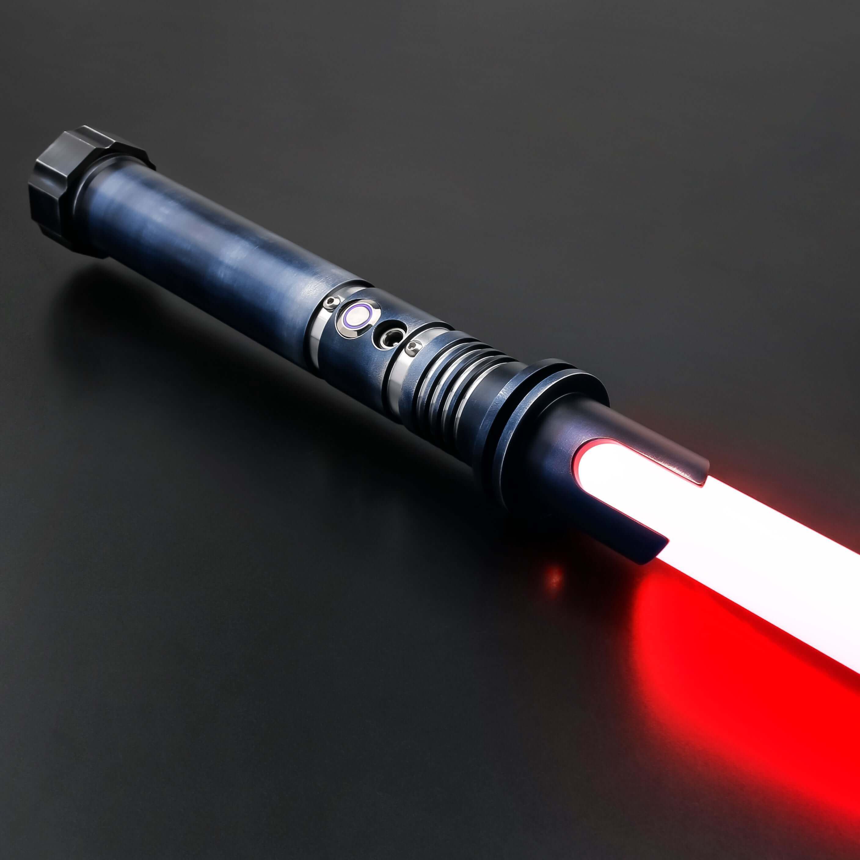 Phantom Lightsaber featuring a sleek, ghostly design with a shimmering aura, crafted from aircraft-grade cast aluminum. Ideal for collectors and duelists, exuding supernatural elegance and power.