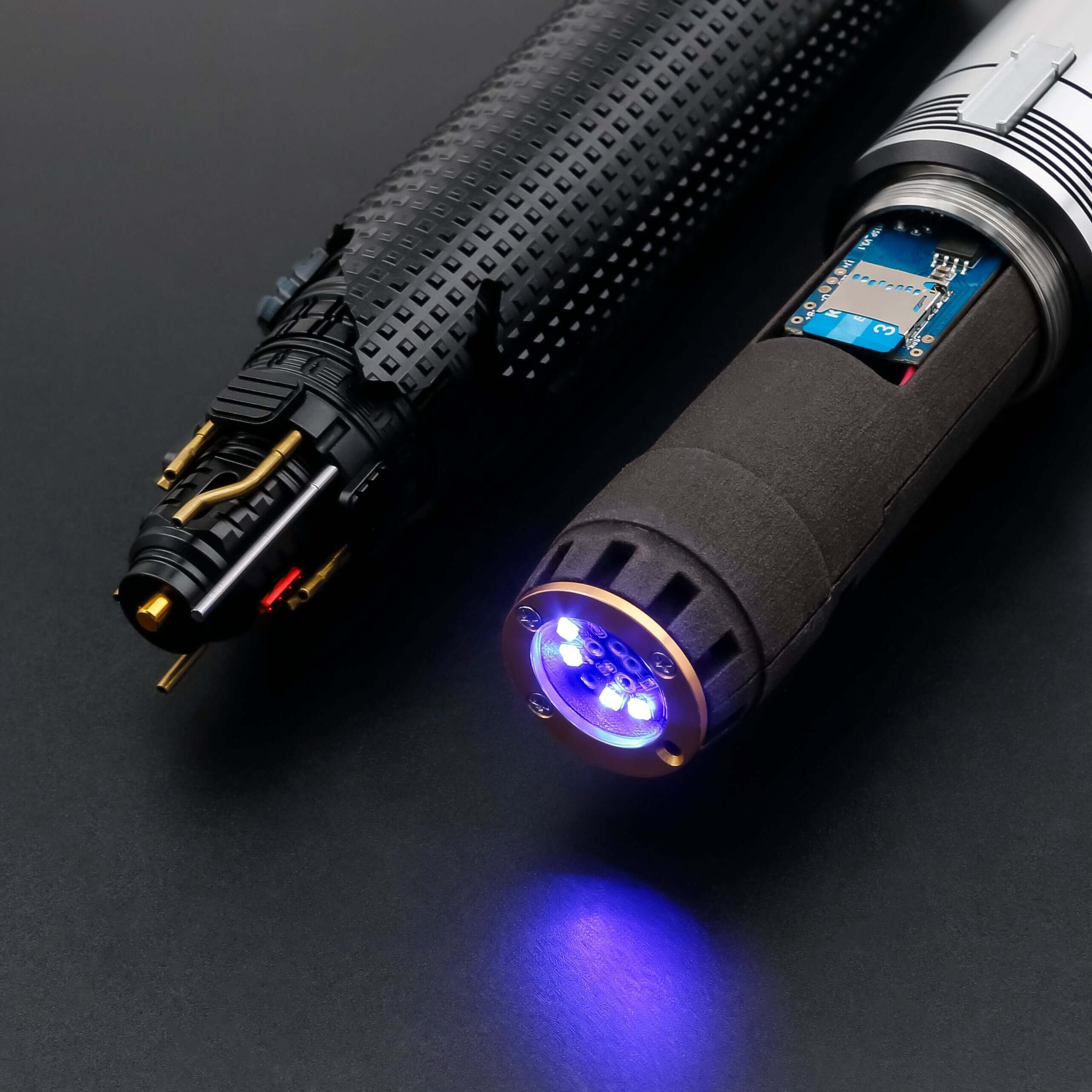 Cal EP3 lightsaber with silver and black anodized aluminum hilt, featuring 12 blade colors, 16 sound fonts, and options for Baselit, S-RGB, Neopixel, or Proffie cores, ideal for cosplay and light dueling