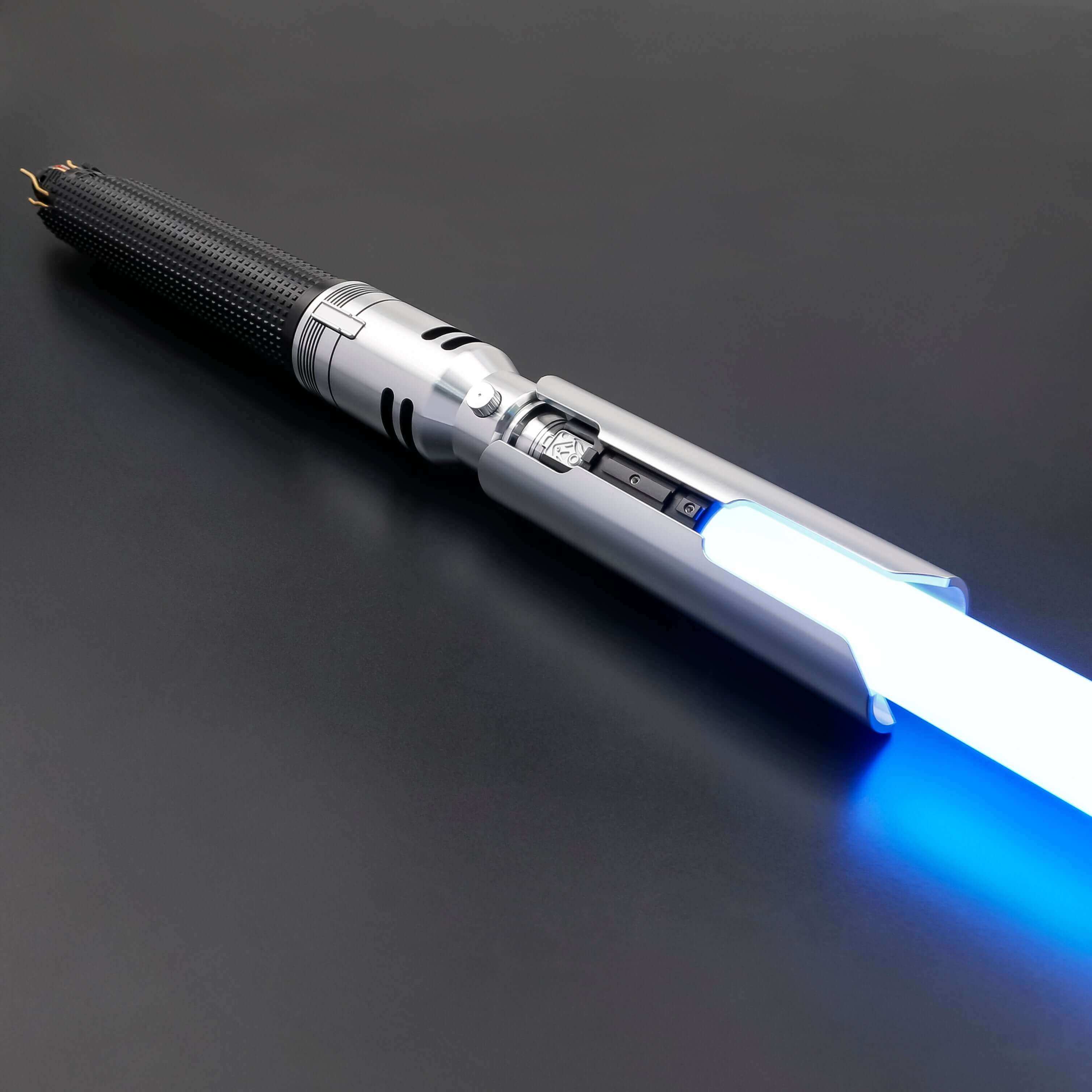 Cal EP3 lightsaber with silver and black anodized aluminum hilt, featuring 12 blade colors, 16 sound fonts, and options for Baselit, S-RGB, Neopixel, or Proffie cores, ideal for cosplay and light dueling