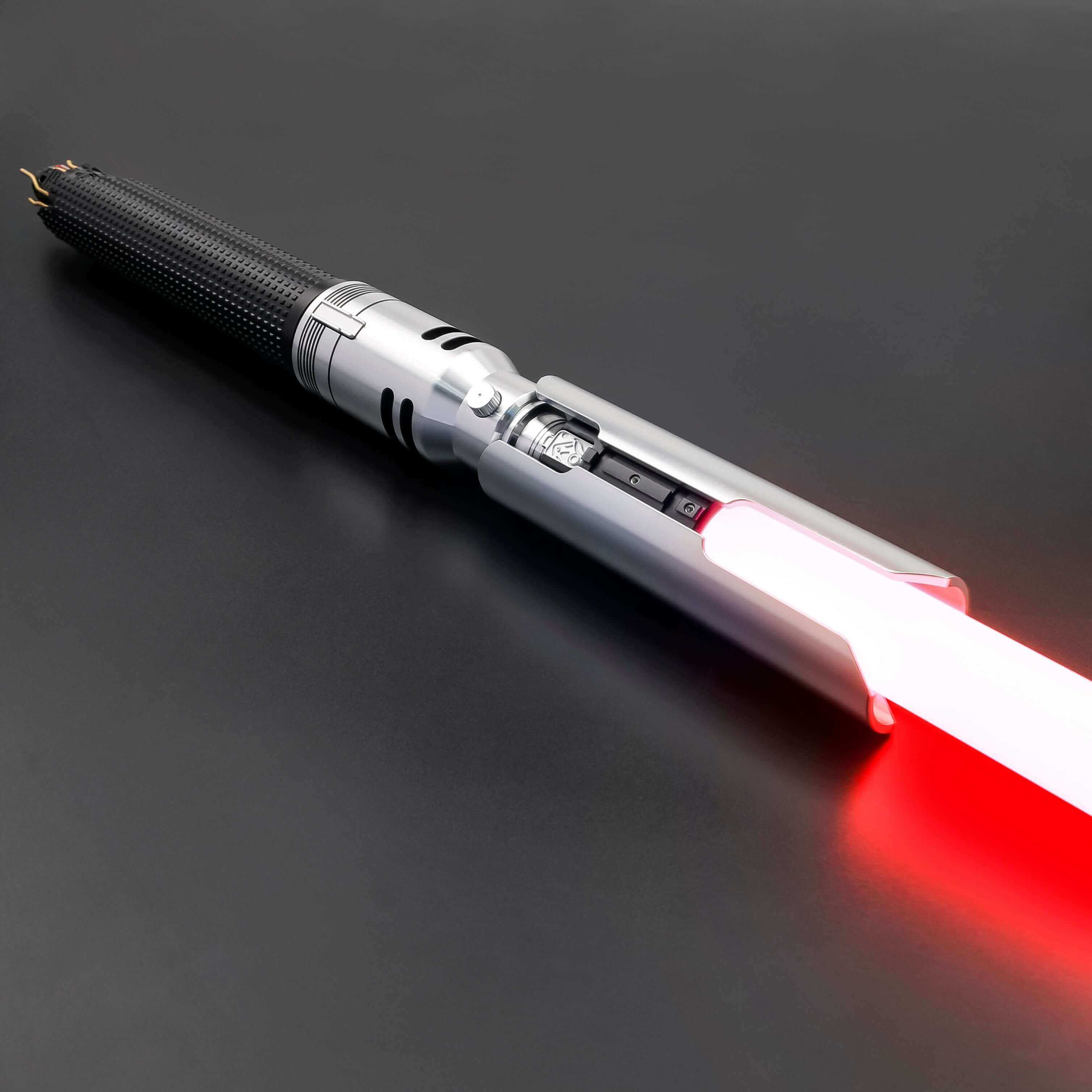 Cal EP3 lightsaber with silver and black anodized aluminum hilt, featuring 12 blade colors, 16 sound fonts, and options for Baselit, S-RGB, Neopixel, or Proffie cores, ideal for cosplay and light dueling