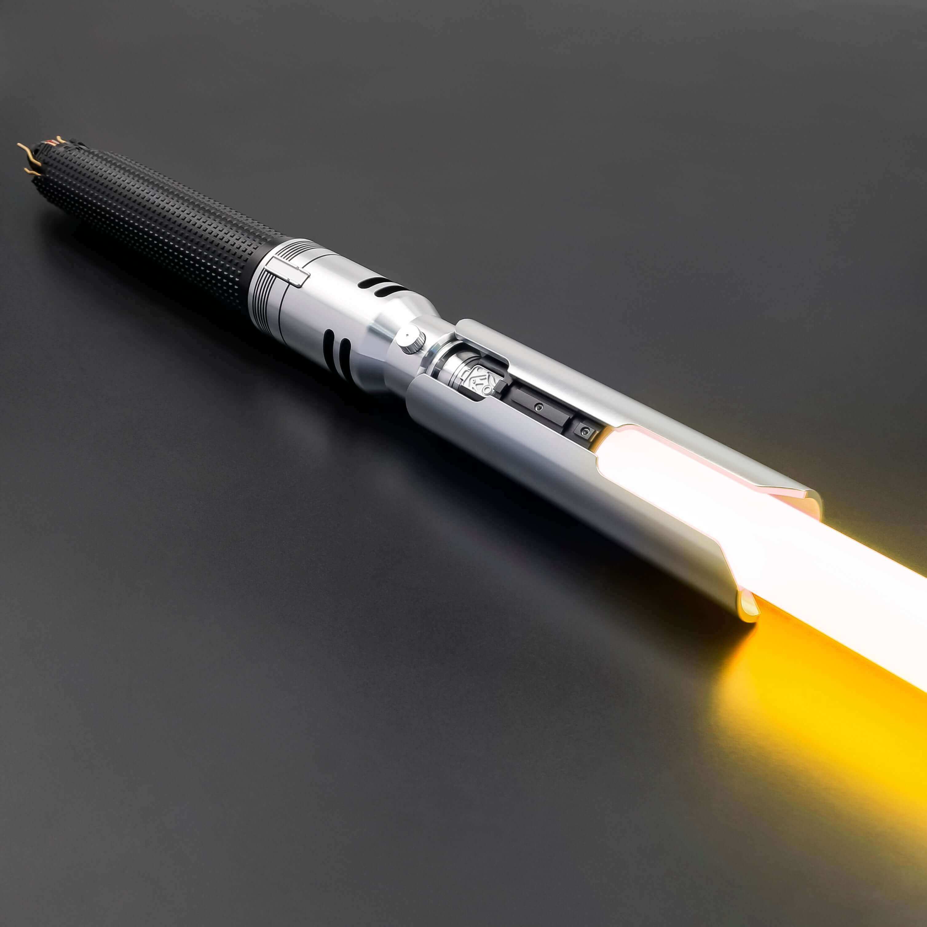 Cal EP3 lightsaber with silver and black anodized aluminum hilt, featuring 12 blade colors, 16 sound fonts, and options for Baselit, S-RGB, Neopixel, or Proffie cores, ideal for cosplay and light dueling
