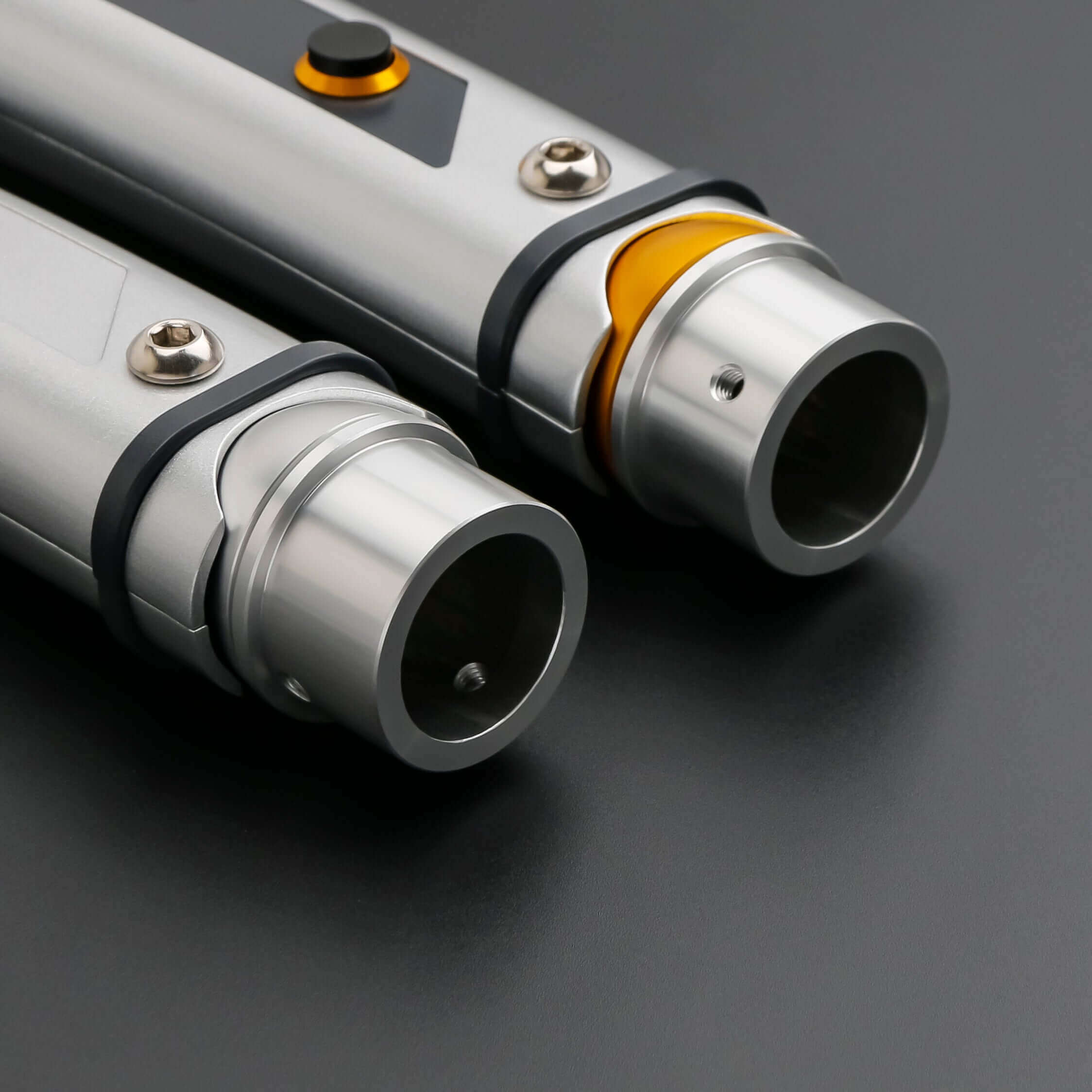 Tano lightsaber with silver and black anodized aluminum hilt, featuring 12 blade colors, 27 sound fonts, and options for Baselit, S-RGB, Neopixel, or Proffie cores, ideal for cosplay and light dueling.