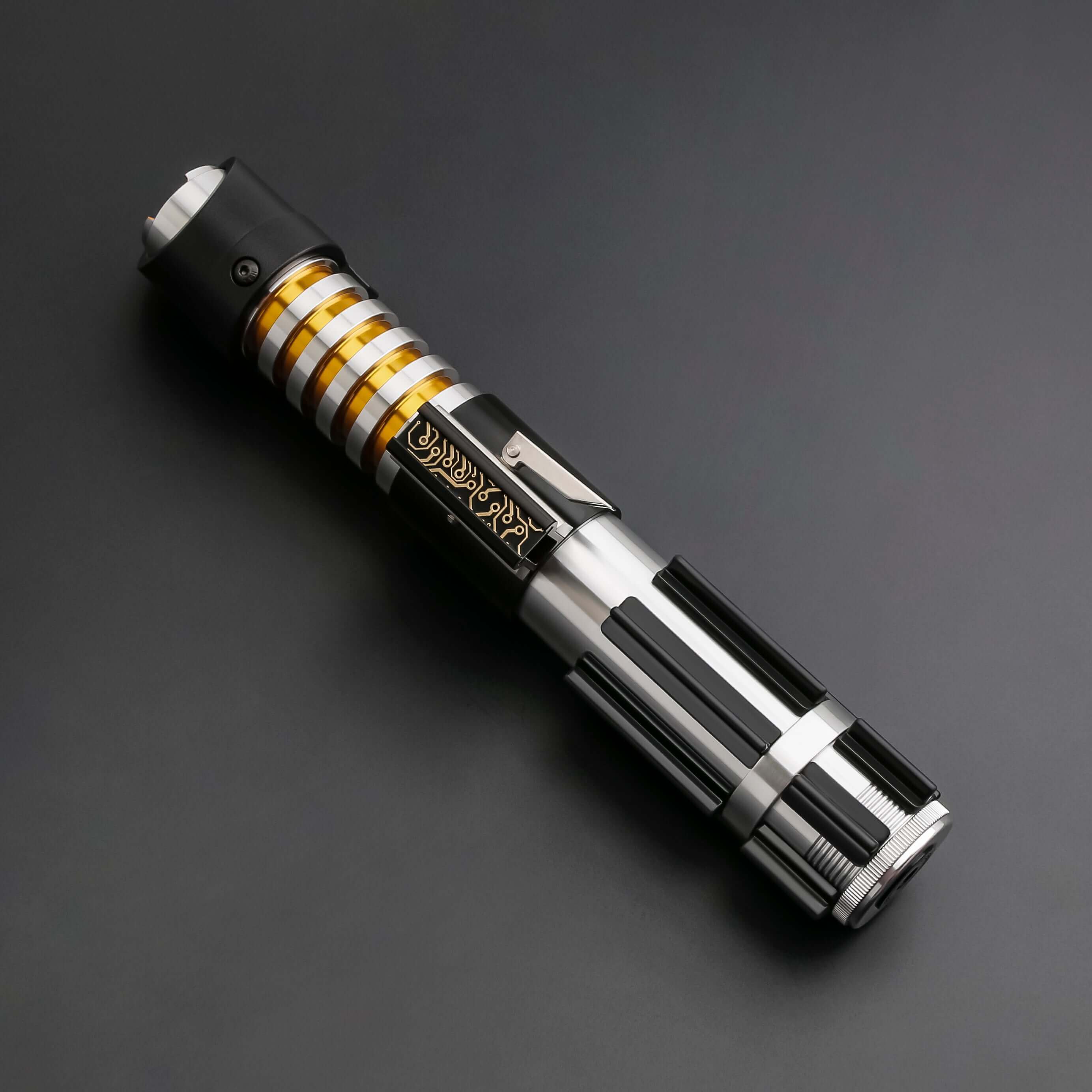 Elzar Mann lightsaber with black anodized aluminum hilt, polished silver accents, 32" polycarbonate blade, 27 sound fonts, 12 blade colors, and Neopixel or Proffie core options for dynamic effects and dueling.