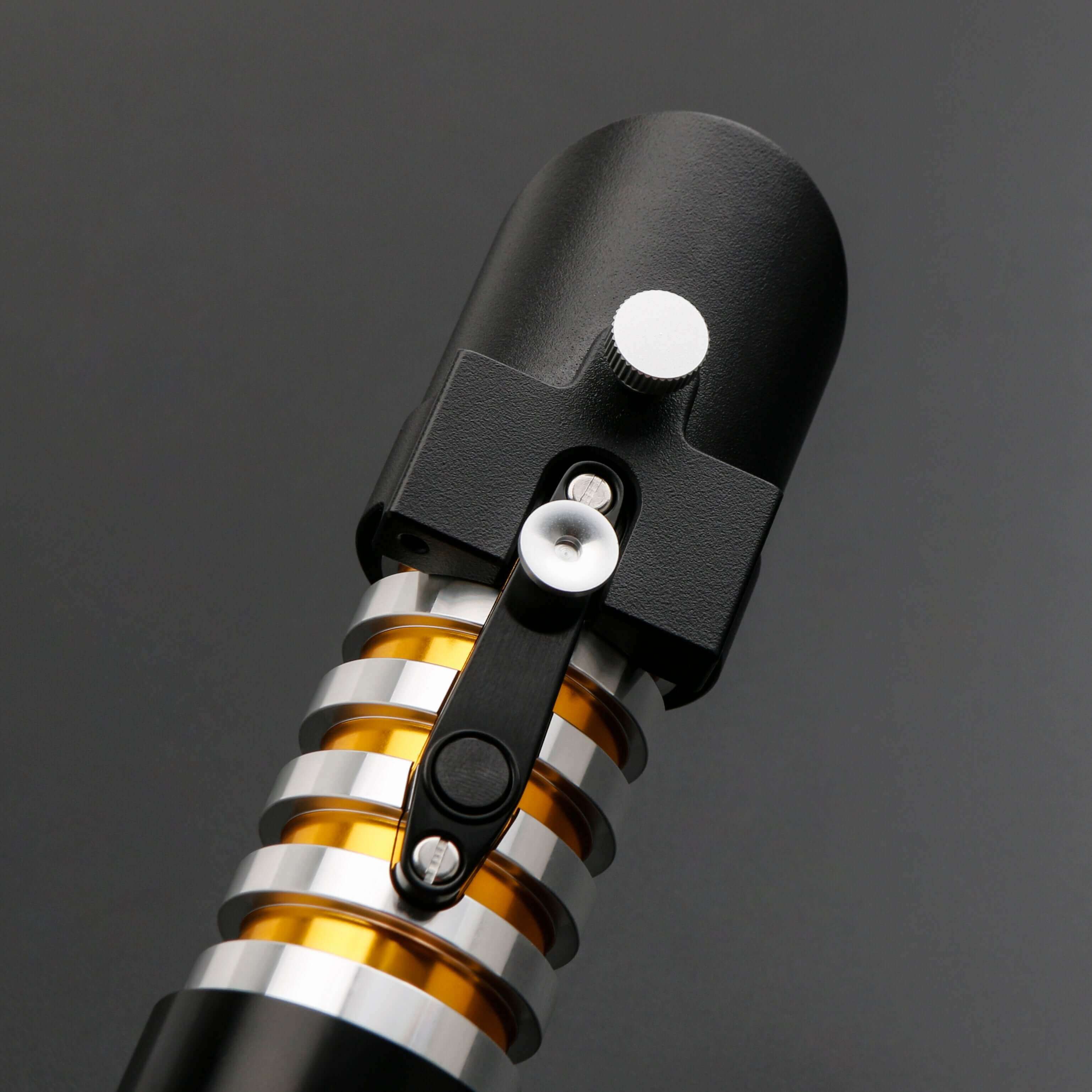 Elzar Mann lightsaber with black anodized aluminum hilt, polished silver accents, 32" polycarbonate blade, 27 sound fonts, 12 blade colors, and Neopixel or Proffie core options for dynamic effects and dueling.