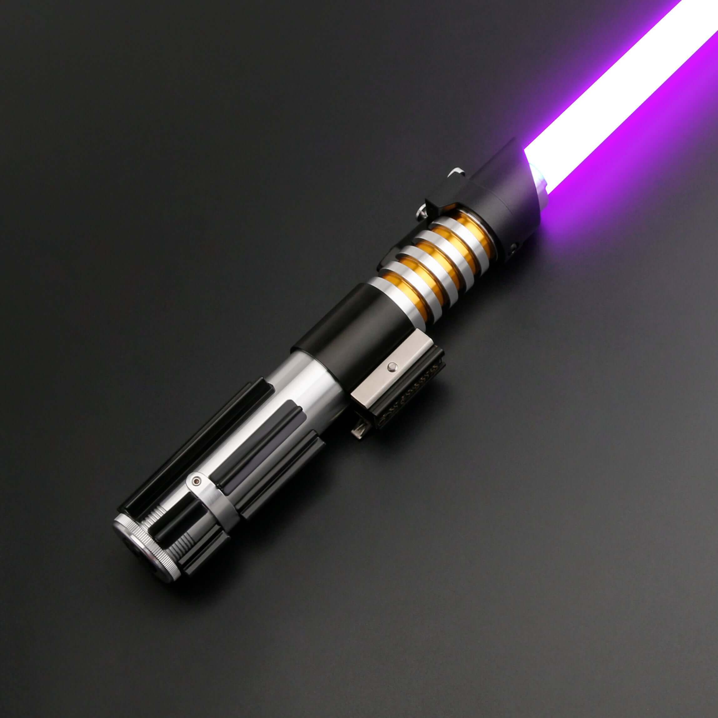 Elzar Mann lightsaber with black anodized aluminum hilt, polished silver accents, 32" polycarbonate blade, 27 sound fonts, 12 blade colors, and Neopixel or Proffie core options for dynamic effects and dueling.