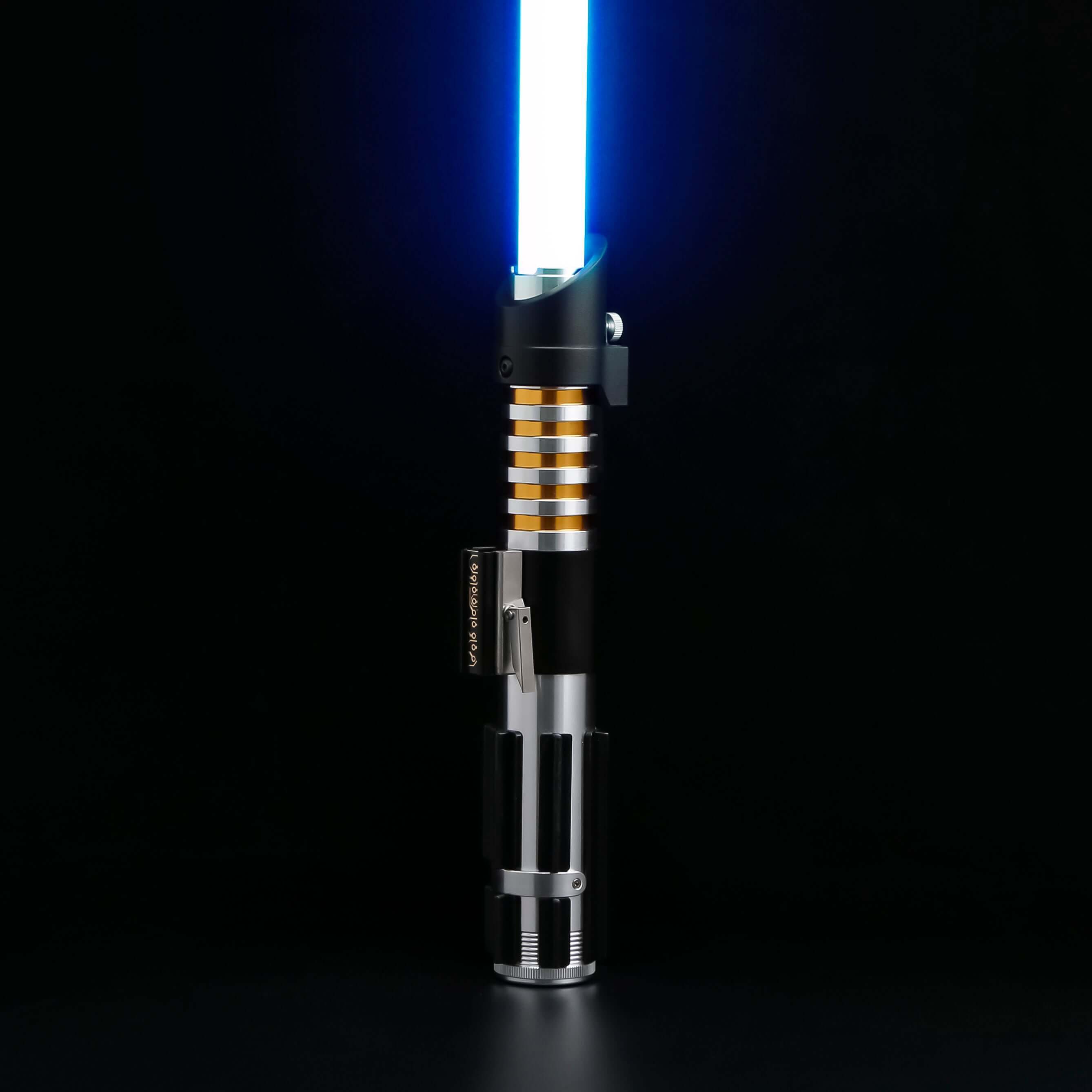 Elzar Mann lightsaber with black anodized aluminum hilt, polished silver accents, 32" polycarbonate blade, 27 sound fonts, 12 blade colors, and Neopixel or Proffie core options for dynamic effects and dueling.
