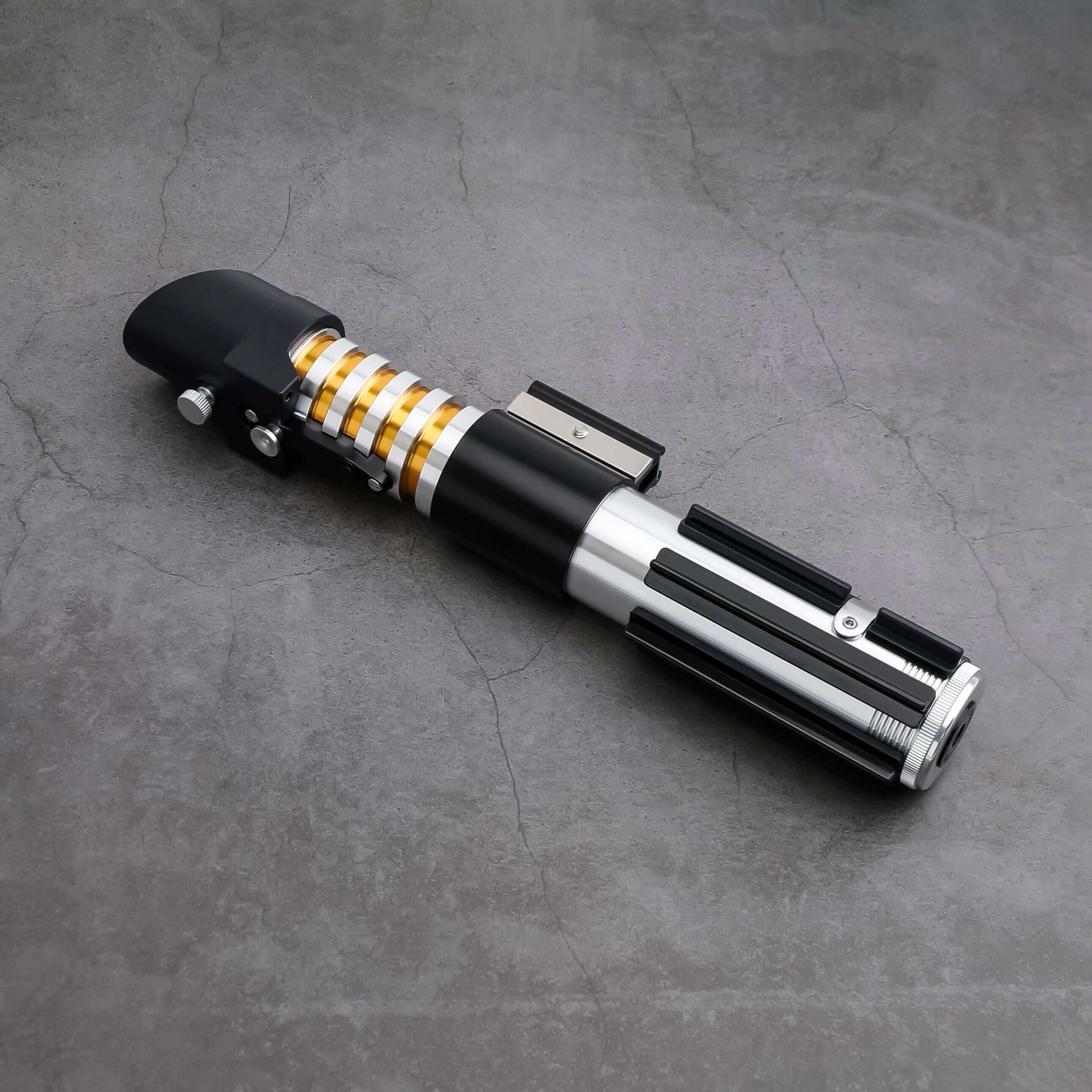 Elzar Mann lightsaber with black anodized aluminum hilt, polished silver accents, 32" polycarbonate blade, 27 sound fonts, 12 blade colors, and Neopixel or Proffie core options for dynamic effects and dueling.