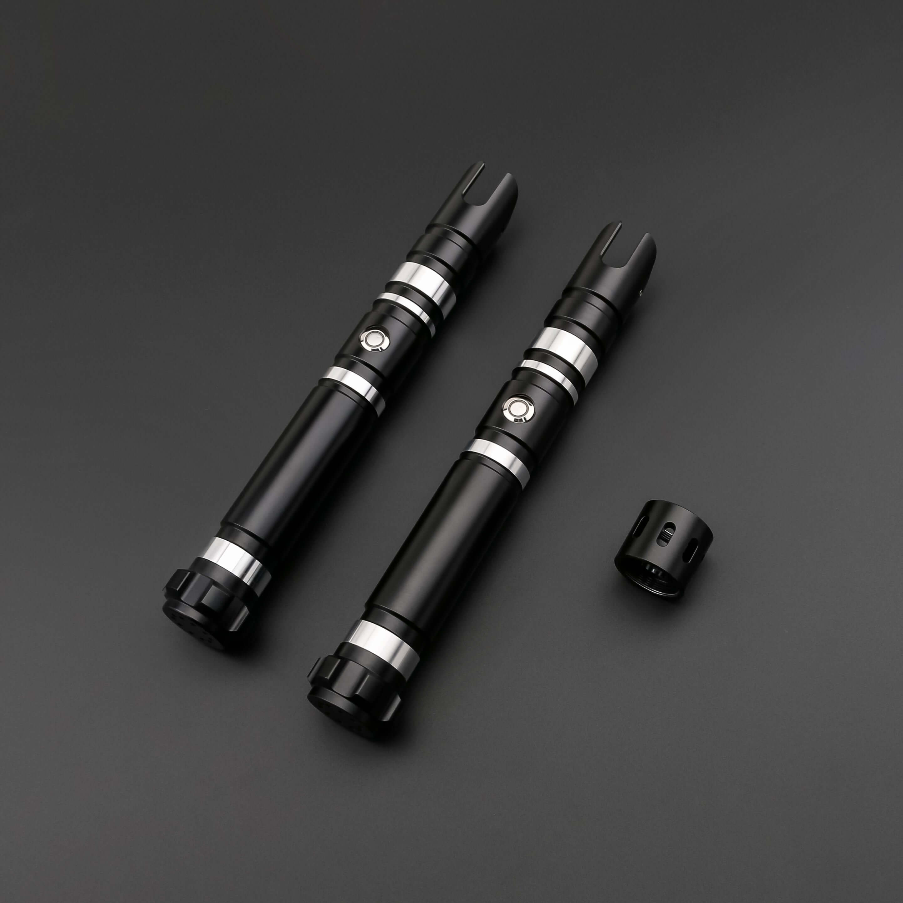 Hunter Dual Sabers featuring lightweight aluminum hilts with circular grip patterns and extended emitter necks, designed for enhanced maneuverability and ideal for cosplay and display.