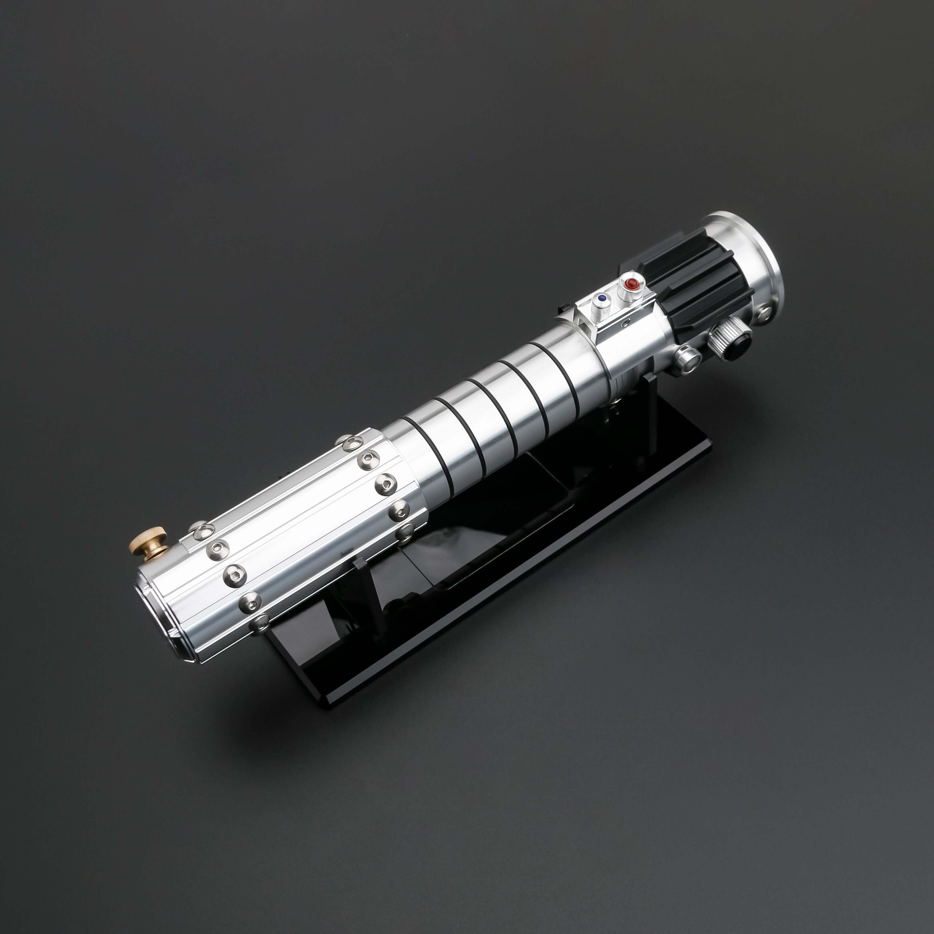 Mara Jade Lightsaber from Novasaber, featuring a sleek, crimson blade and a detailed, silver hilt with elegant design accents, inspired by the iconic Star Wars character.