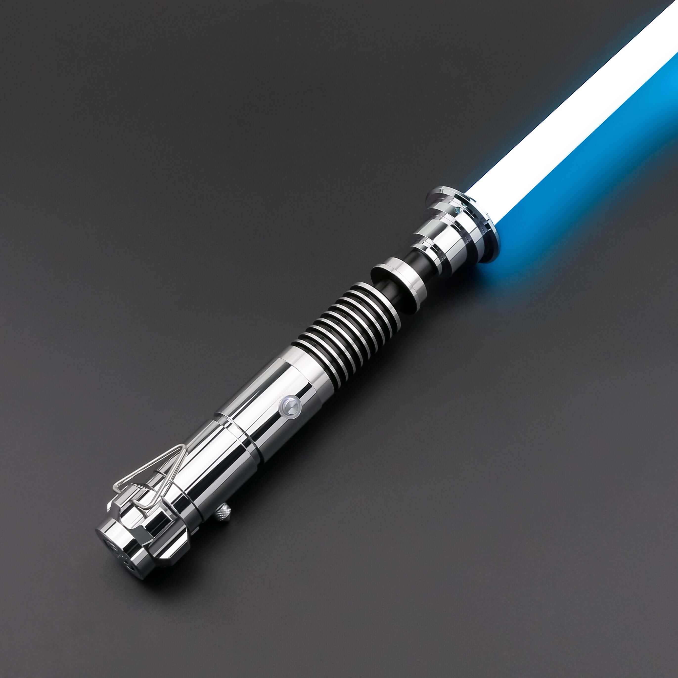 Luke SE Lightsaber from Novasaber, featuring a polished silver hilt with detailed gold accents and a vibrant green blade, inspired by the iconic weapon of Luke Skywalker from Star Wars