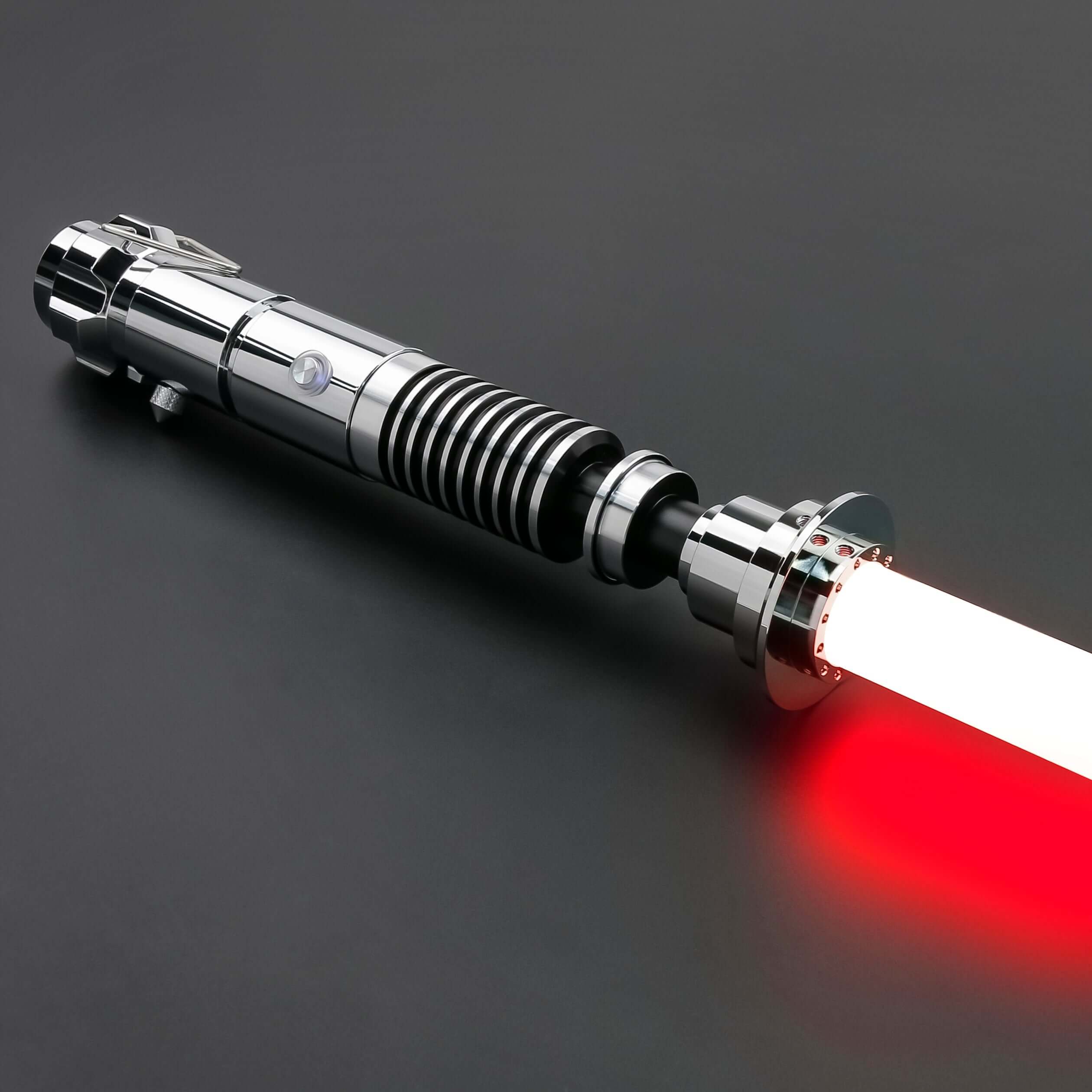 Luke SE Lightsaber from Novasaber, featuring a polished silver hilt with detailed gold accents and a vibrant green blade, inspired by the iconic weapon of Luke Skywalker from Star Wars