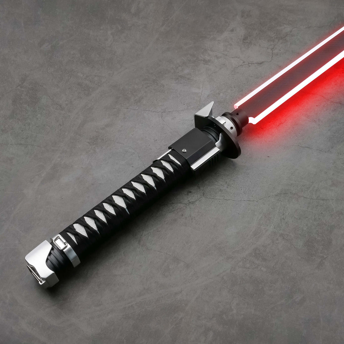 RoninDiscover the Ronin Saber, meticulously crafted, inspired by the wandering samurai of ancient Japan. Made with aerospace-grade aluminum, this piece embodies the spirit of a lone warrior, complete with a luminous LED blade.