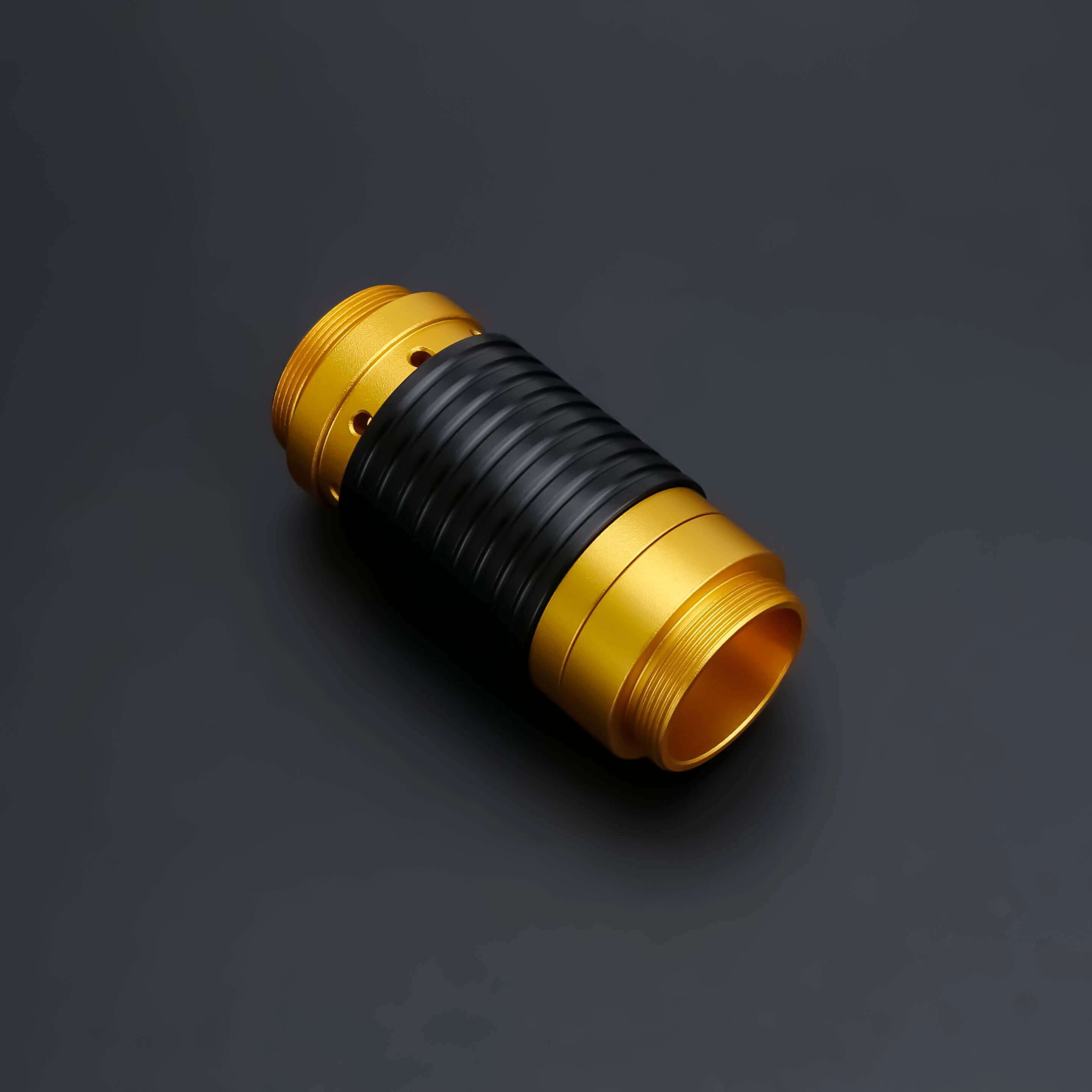 Universal quick release coupler in gold and black, designed for 1-inch diameter lightsaber handles.