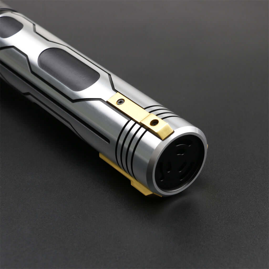 Close-up of the Skyrim lightsaber showcasing its sleek silver design and ornate gold accents for enhanced grip and style.