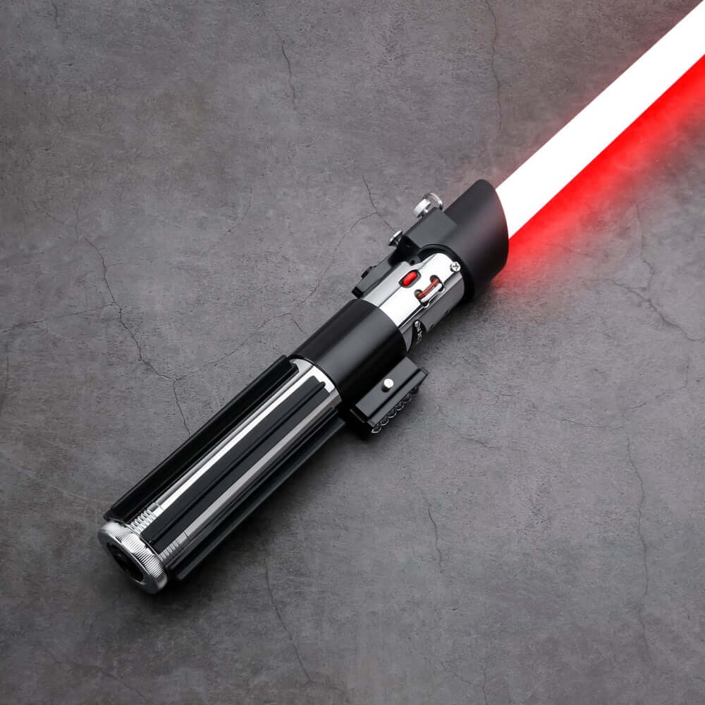 Vader Proffie 2.2 lightsaber with a glowing red blade on a textured surface