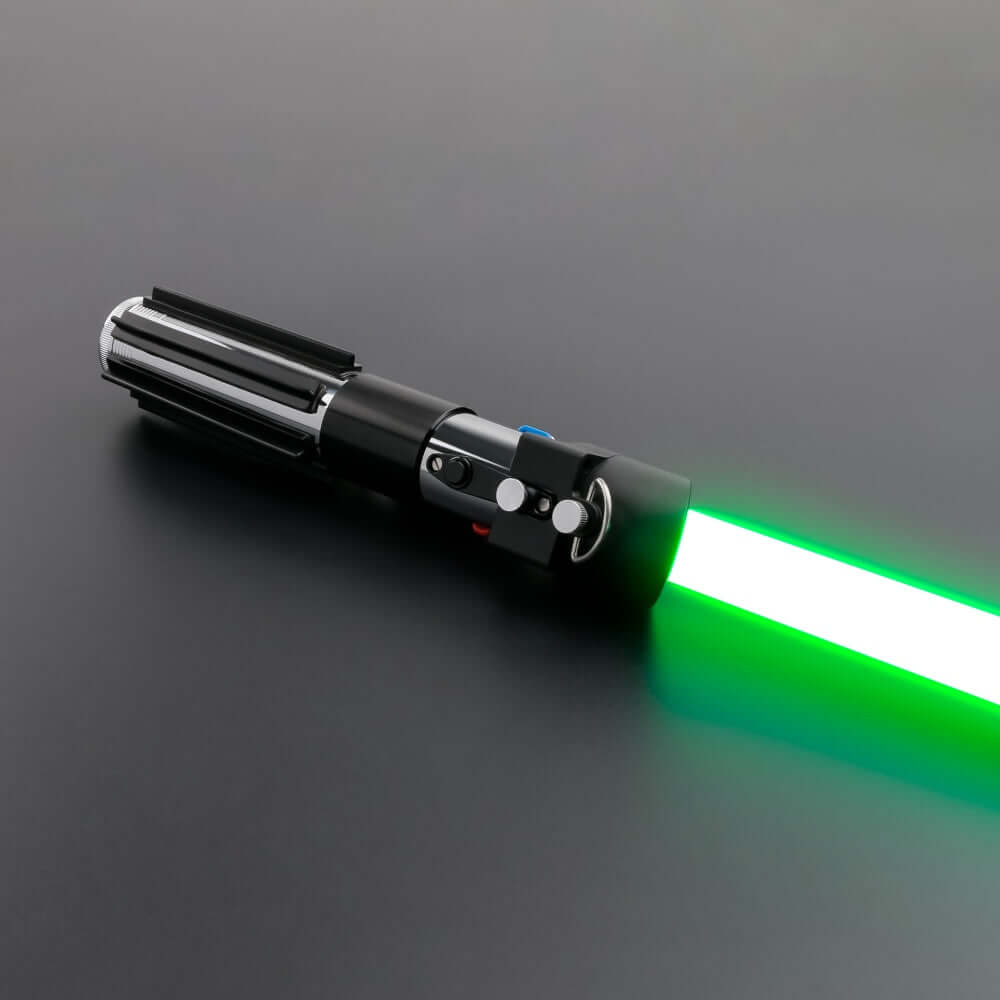 Vader Proffie 2.2 lightsaber with a green blade lying on a black surface, perfect for fans and cosplayers.