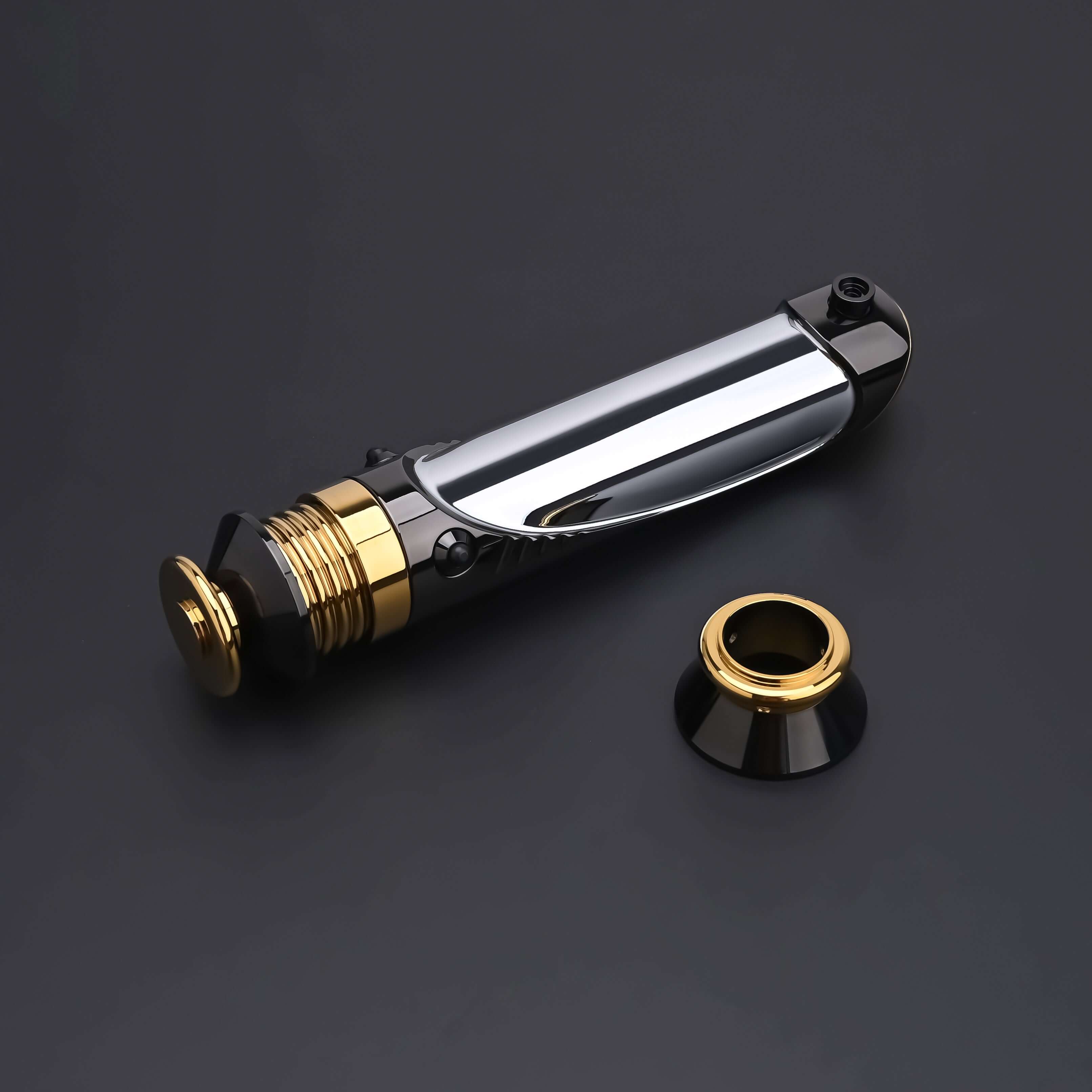 Emperor lightsaber hilt with interchangeable emitter component displayed