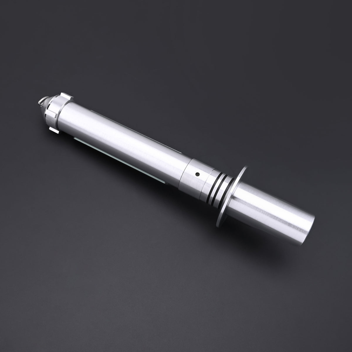 Overhead view of the Kanan SE lightsaber hilt in metallic finish without blade