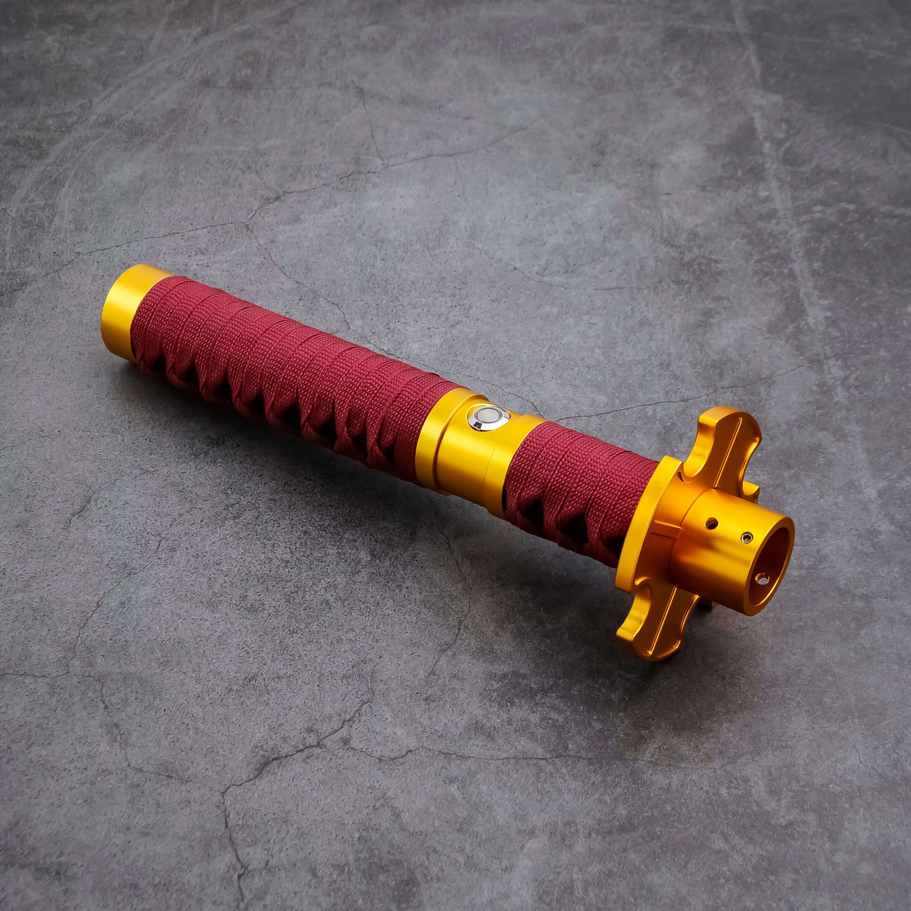 Sekiro Lightsaber: Katana-inspired design with gold hilt, red grip, and gold guard, crafted from aircraft-grade aluminum for durability and elegance.
