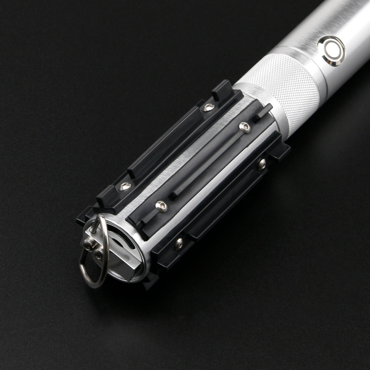 Close-up of the Obsidian Elite Trinity lightsaber hilt design and grip details
