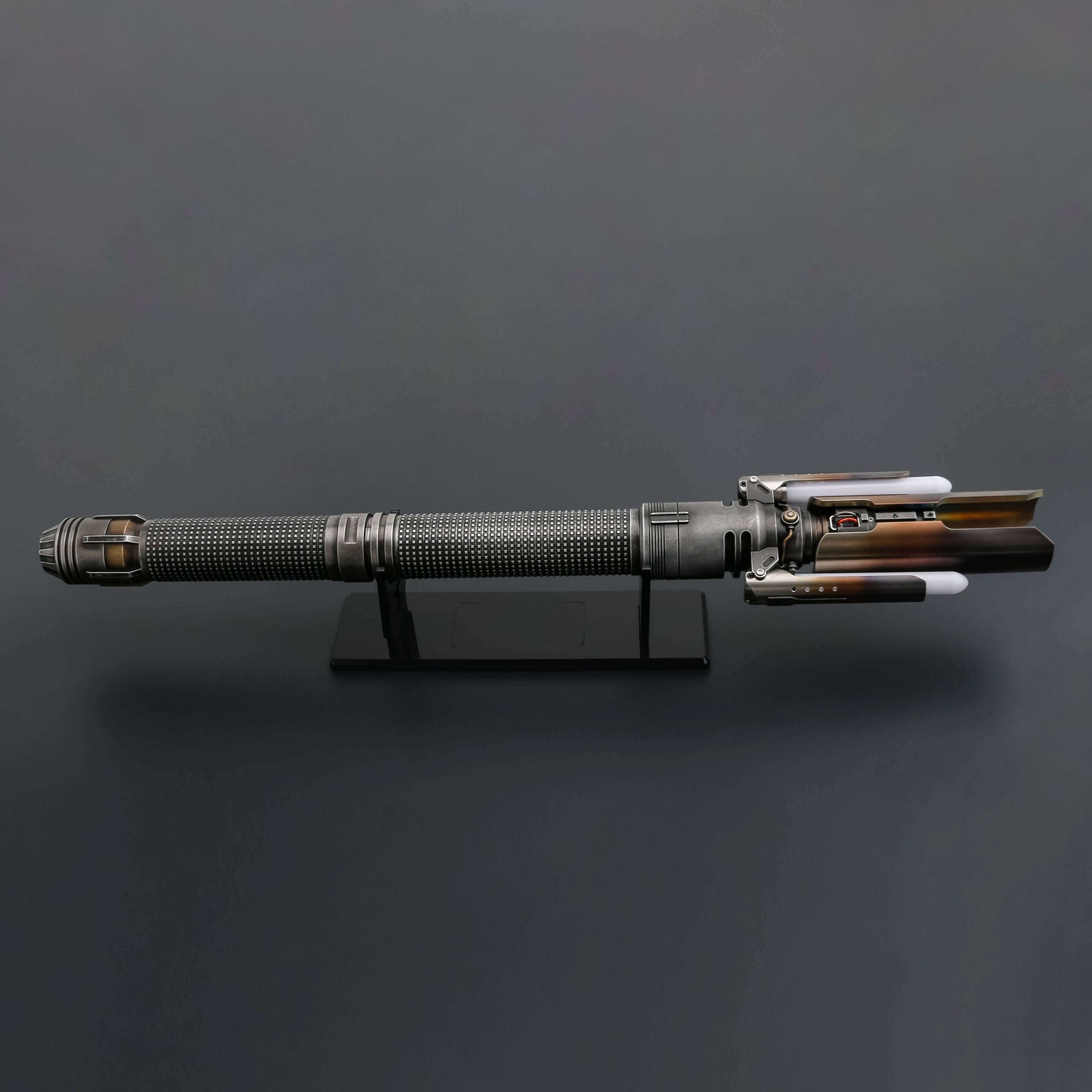 Custom Survivor inspired lightsaber displayed on a stand against a dark background.