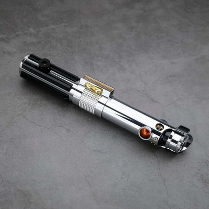 Ani EP3 Proffie 2.2 lightsaber on a textured surface, showcasing its sleek design and details.