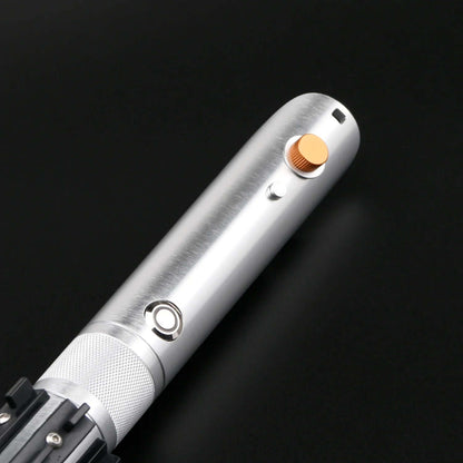 Close-up of the Combat Saber-Anakin hilt showcasing polished metal finish and distinct button details.