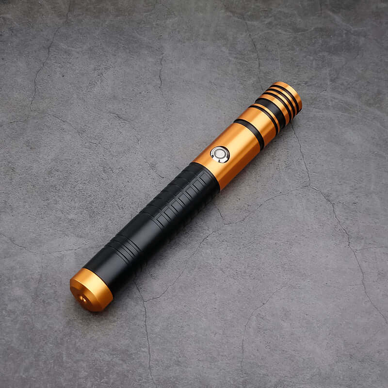 Jedi survivor twin lightsaber with curved emitter and stylish black and gold design.