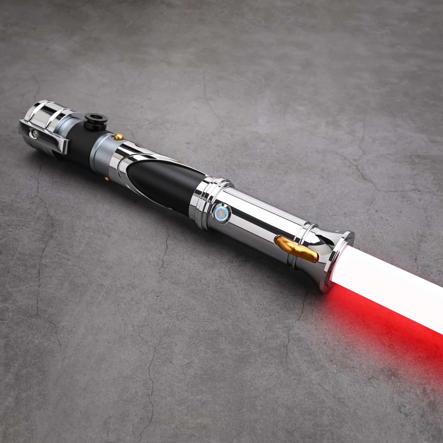 Count SE Lightsaber with black and silver hilt, spiraling silver trim, gold and red accents, and flared emitter. Crafted from aircraft-grade aluminum for balance, control, and precision.