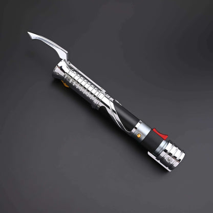 Count SE Lightsaber with black and silver hilt, spiraling silver trim, gold and red accents, and flared emitter. Crafted from aircraft-grade aluminum for balance, control, and precision.