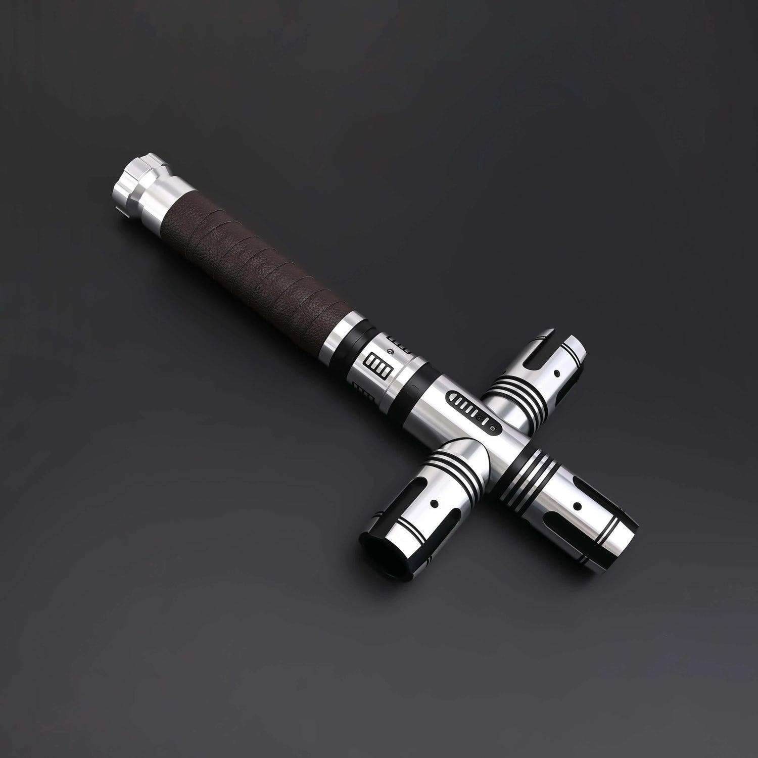 Crusades Lightsaber featuring a cross-guard design with black and silver accents on a dark background.