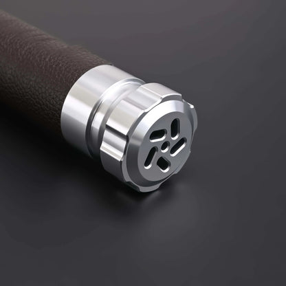 Close-up of the hilt of the Crusades Lightsaber featuring a sleek metallic design and textured grip.