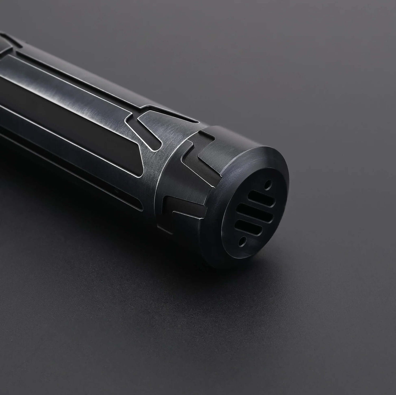 Close-up of the hilt of the Halo Crystal lightsaber showcasing intricate design and detailing.
