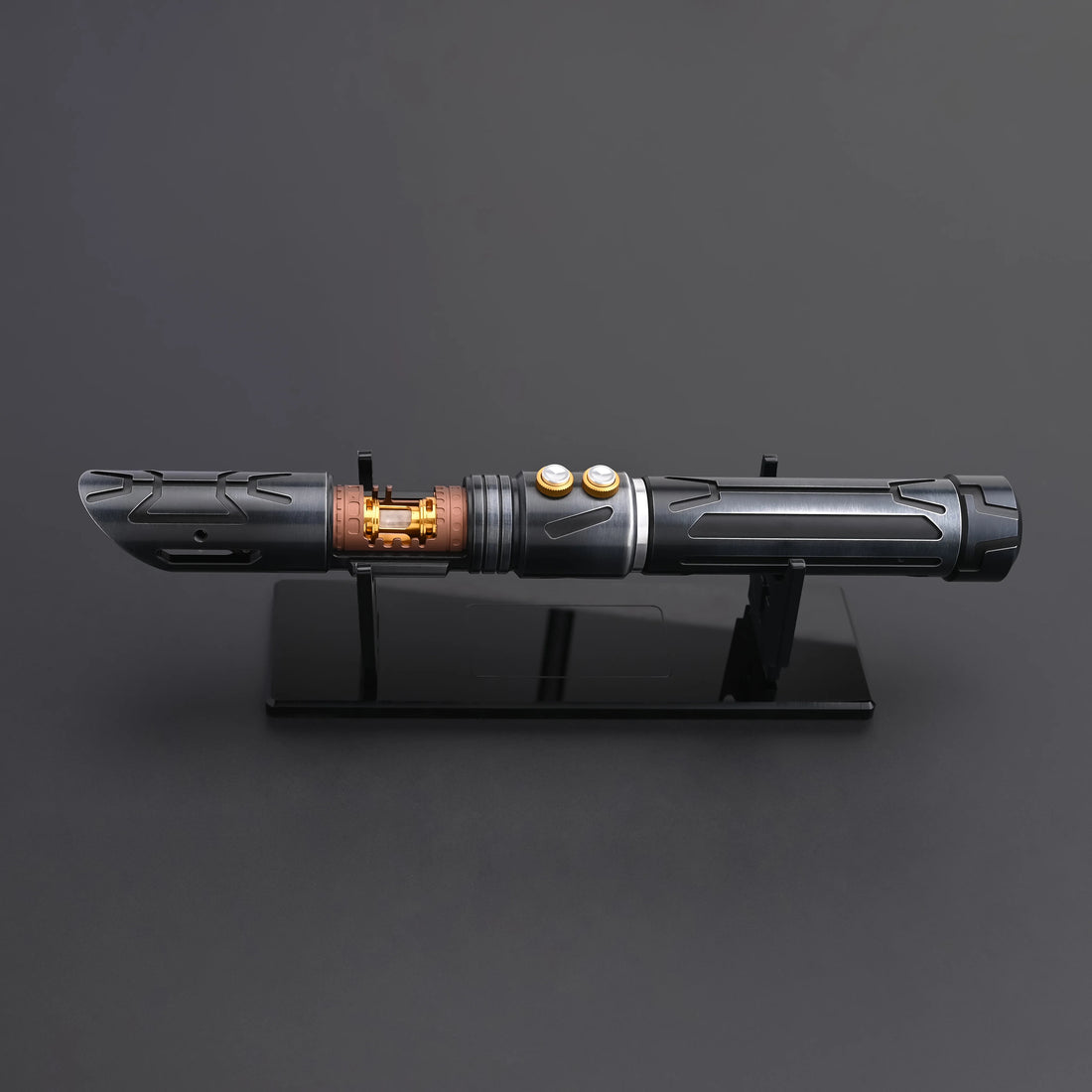 Halo crystal lightsaber displayed on a stand, showcasing its exposed crystal core and dual-button control system.