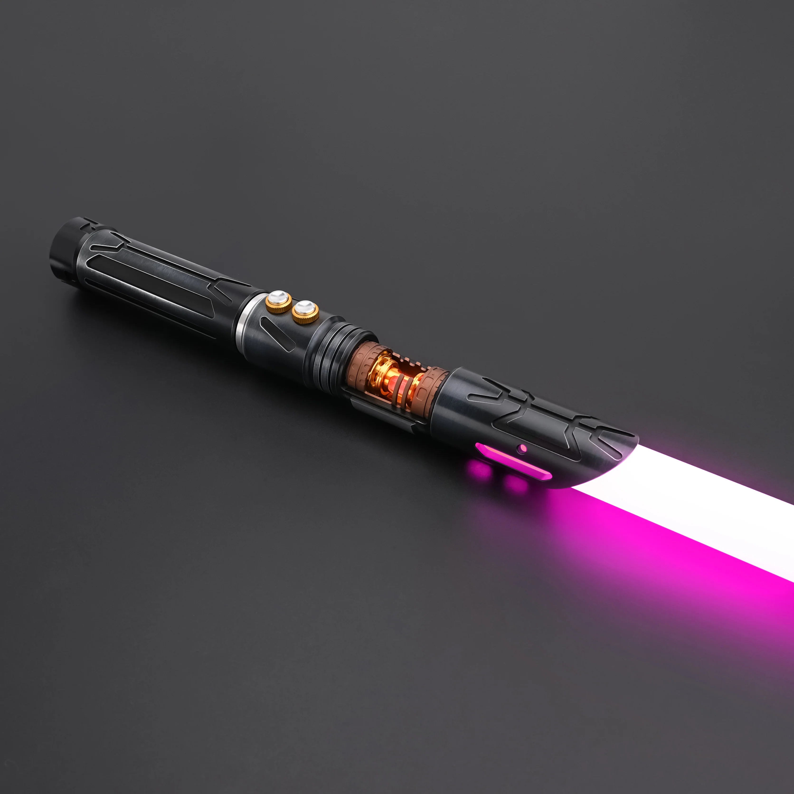 Halo crystal lightsaber with exposed crystal core and dual-button control, emitting a vibrant pink blade.