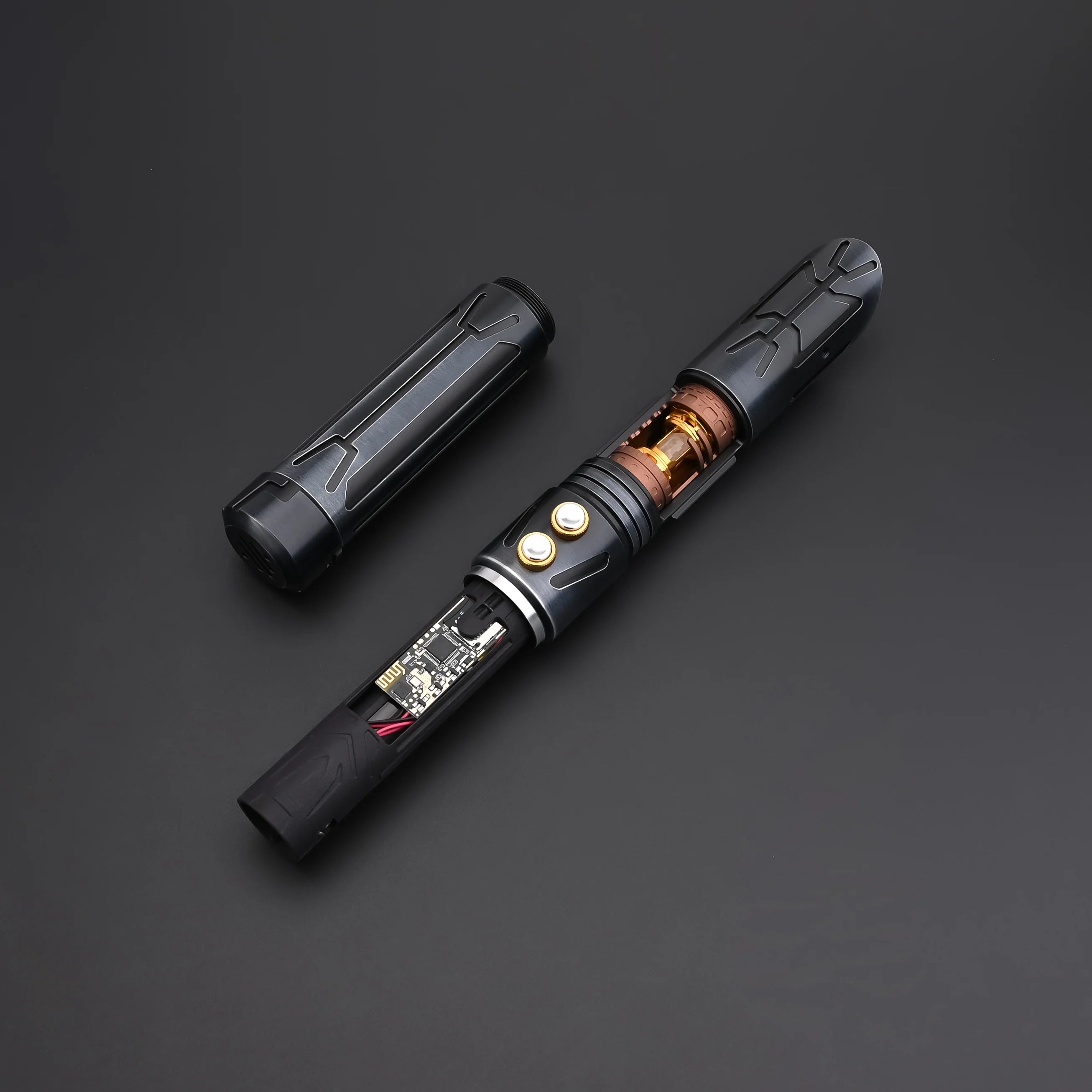 Close-up of the Halo Crystal lightsaber showing its exposed crystal core and dual-button control system.