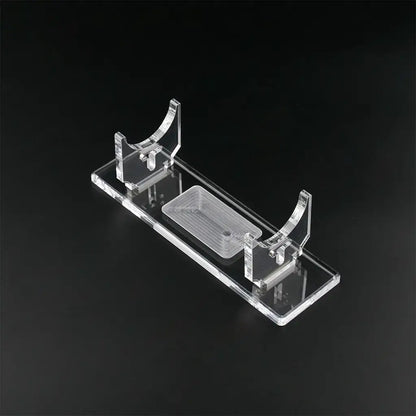 Clear Acrylic Saber Stand: Sleek, transparent design providing stability and visual appeal for showcasing collectible lightsabers.