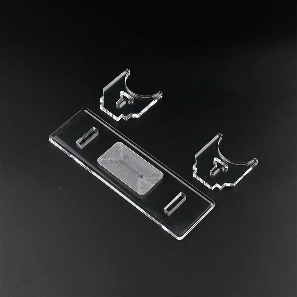 Clear Acrylic Saber Stand: Sleek, transparent design providing stability and visual appeal for showcasing collectible lightsabers.