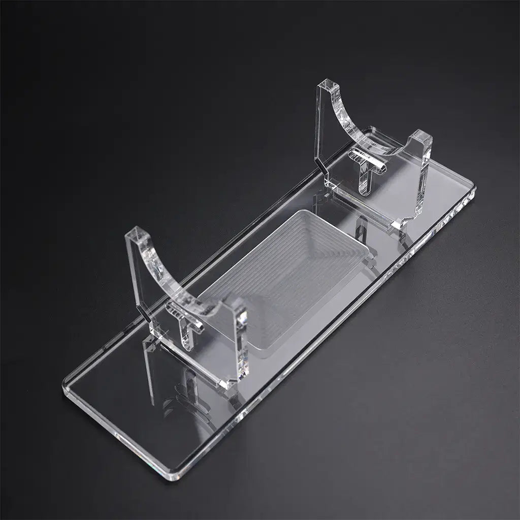 Clear Acrylic Saber Stand: Sleek, transparent design providing stability and visual appeal for showcasing collectible lightsabers.