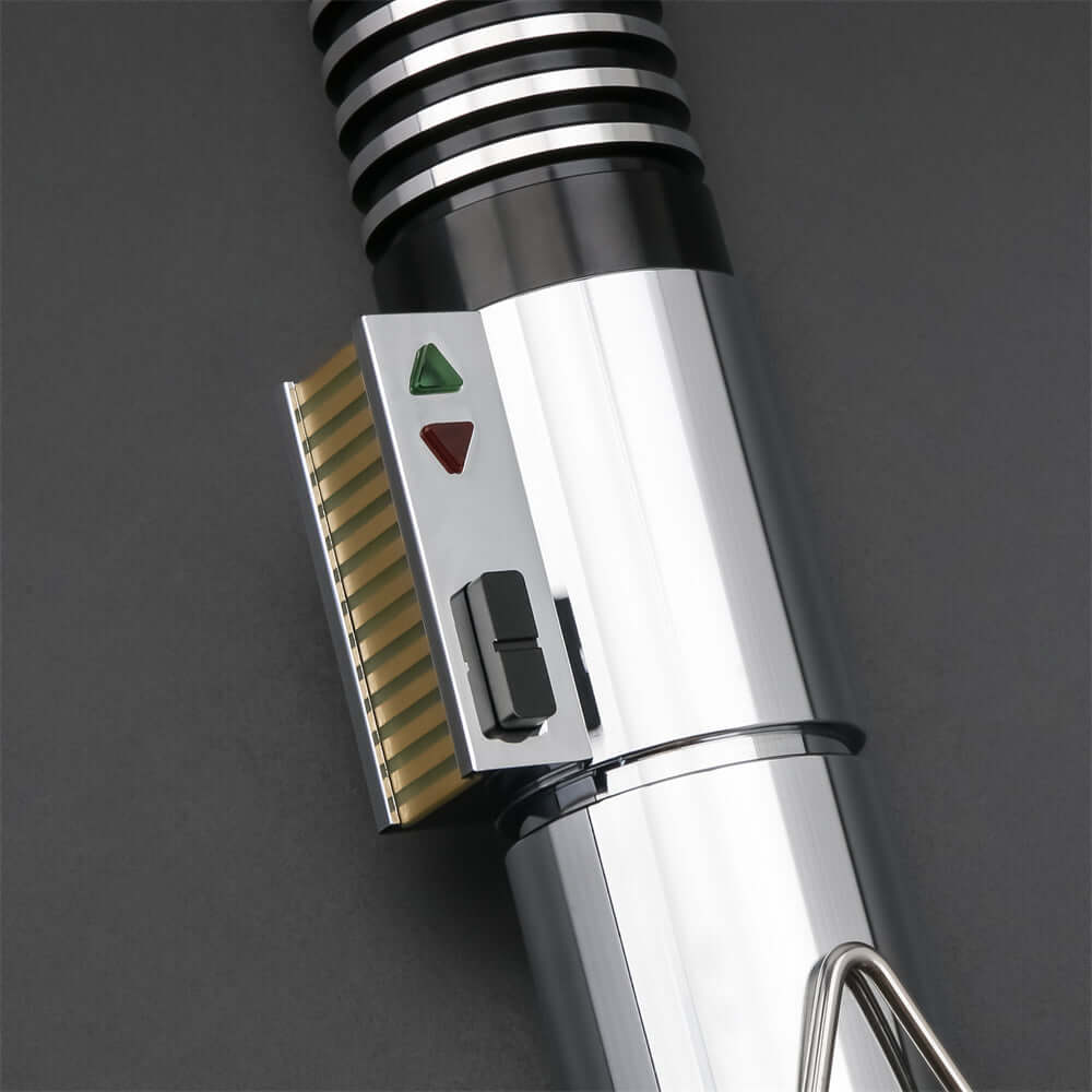 Close-up of the Luke EP6 lightsaber replica showing the grip details and control buttons.