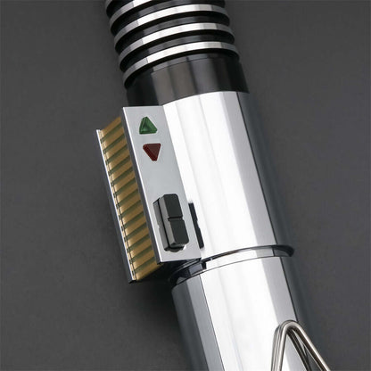 Close-up of the Luke EP6 lightsaber replica showing the grip details and control buttons.