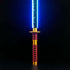 SekiroThe Sekiro Lightsaber by Nsabers combines traditional katana artistry with modern craftsmanship. Featuring a gold-colored hilt, red tsuka-ito-style grip, and a delicate gold guard, it exudes sophistication and practicality. Made from lightweight, du