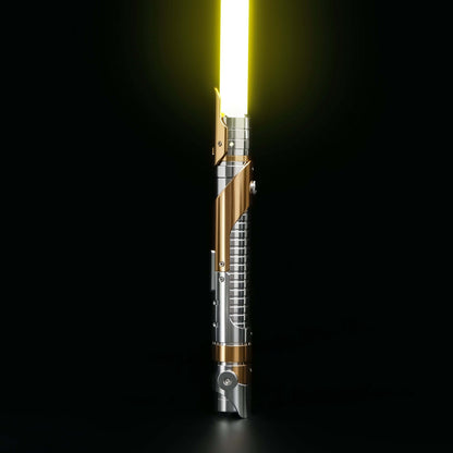 Skeleton Crew SE lightsaber with silver and gold hilt, featuring Baselit, S-RGB, Neopixel, or Proffie core options, 12 blade colors, multiple blade effects, and a durable design suitable for display and light dueling.